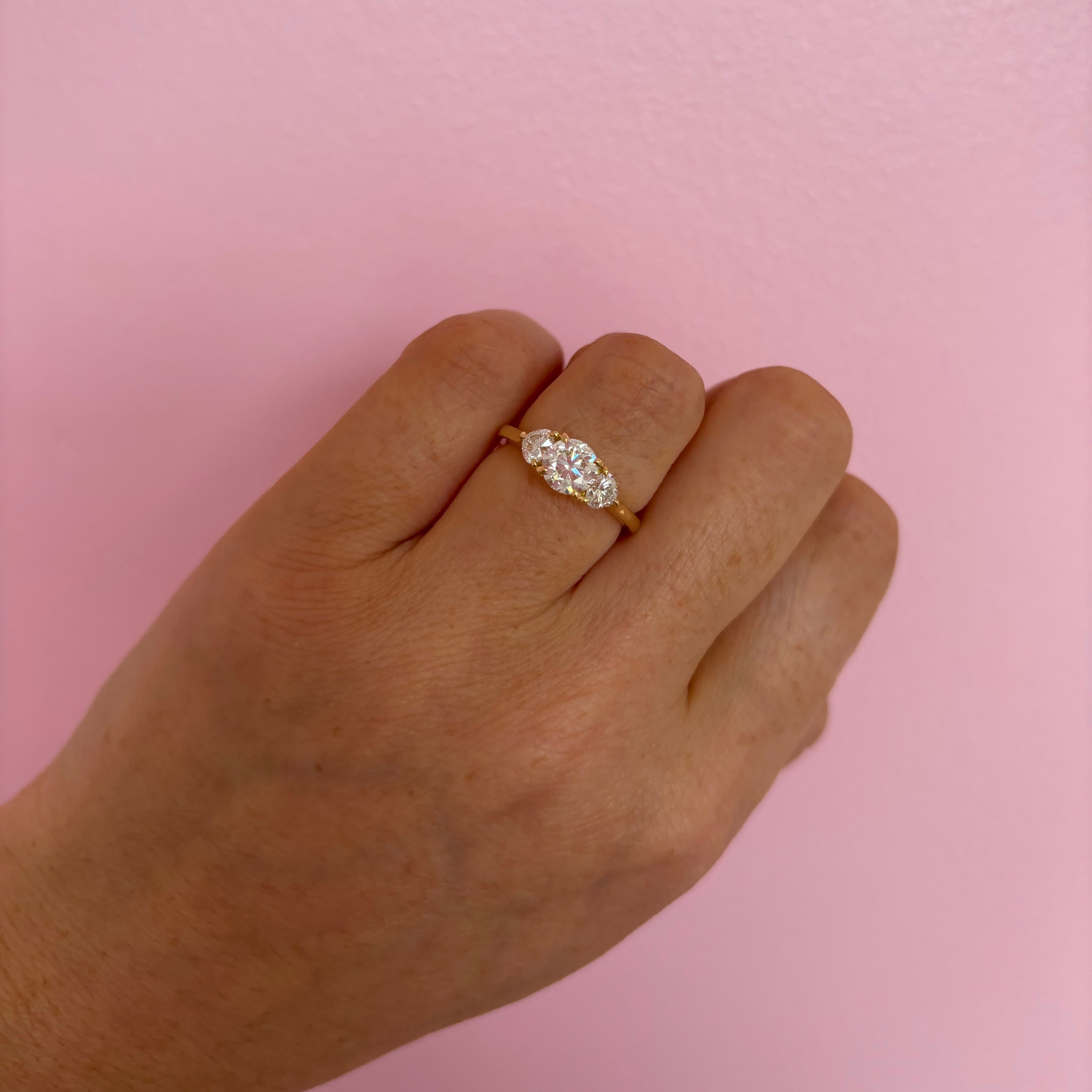 18ct gold 0.90ct round cut centre and two heart shaped diamond ‘Hidden Hearts’ ring