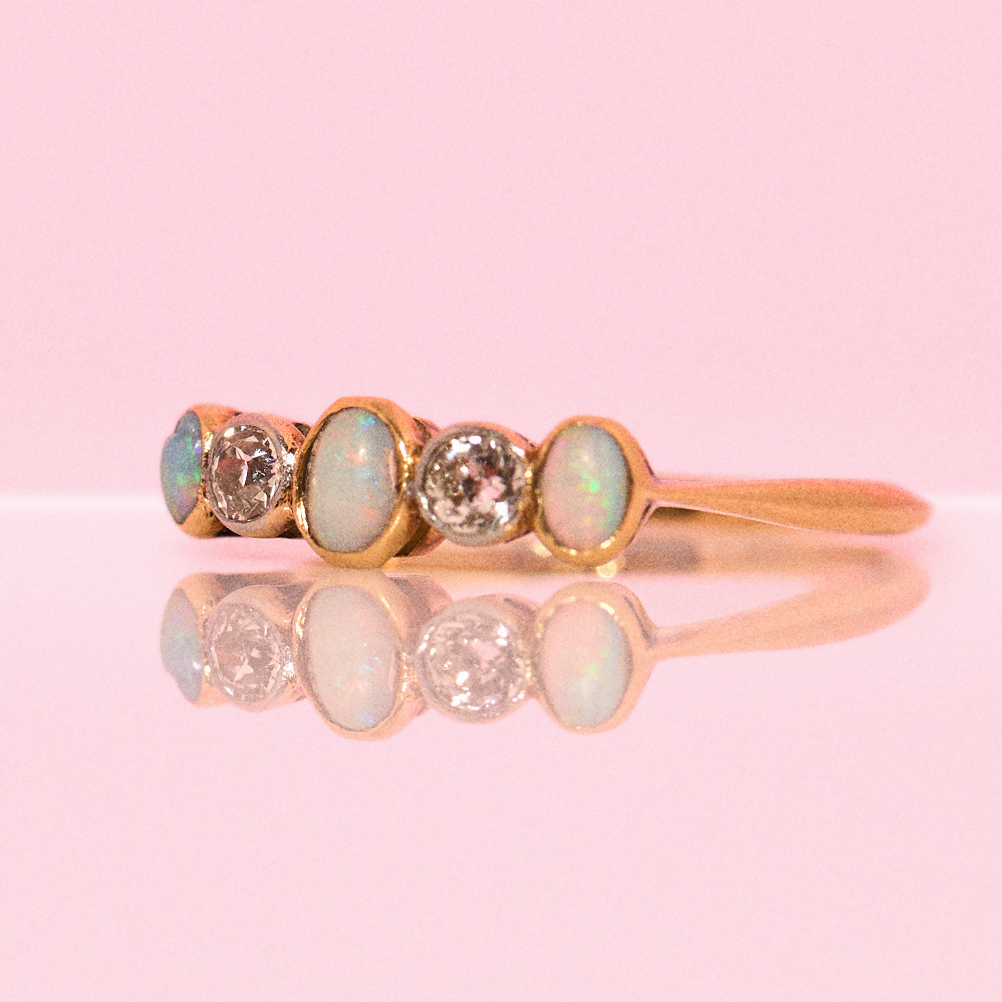 18ct gold art deco bezel set opal and diamond half eternity ring