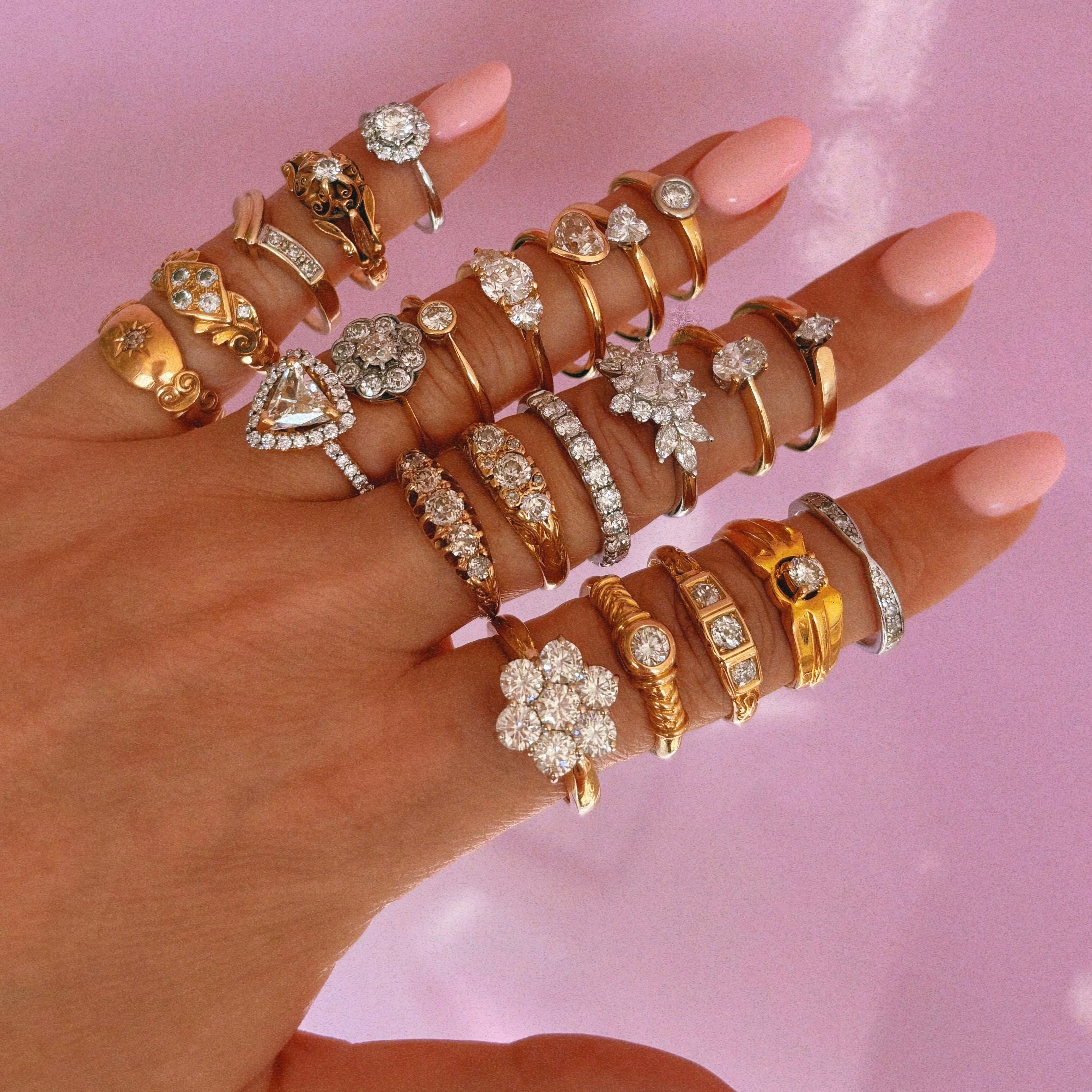 18ct gold 0.90ct round cut centre and two heart shaped diamond ‘Hidden Hearts’ ring