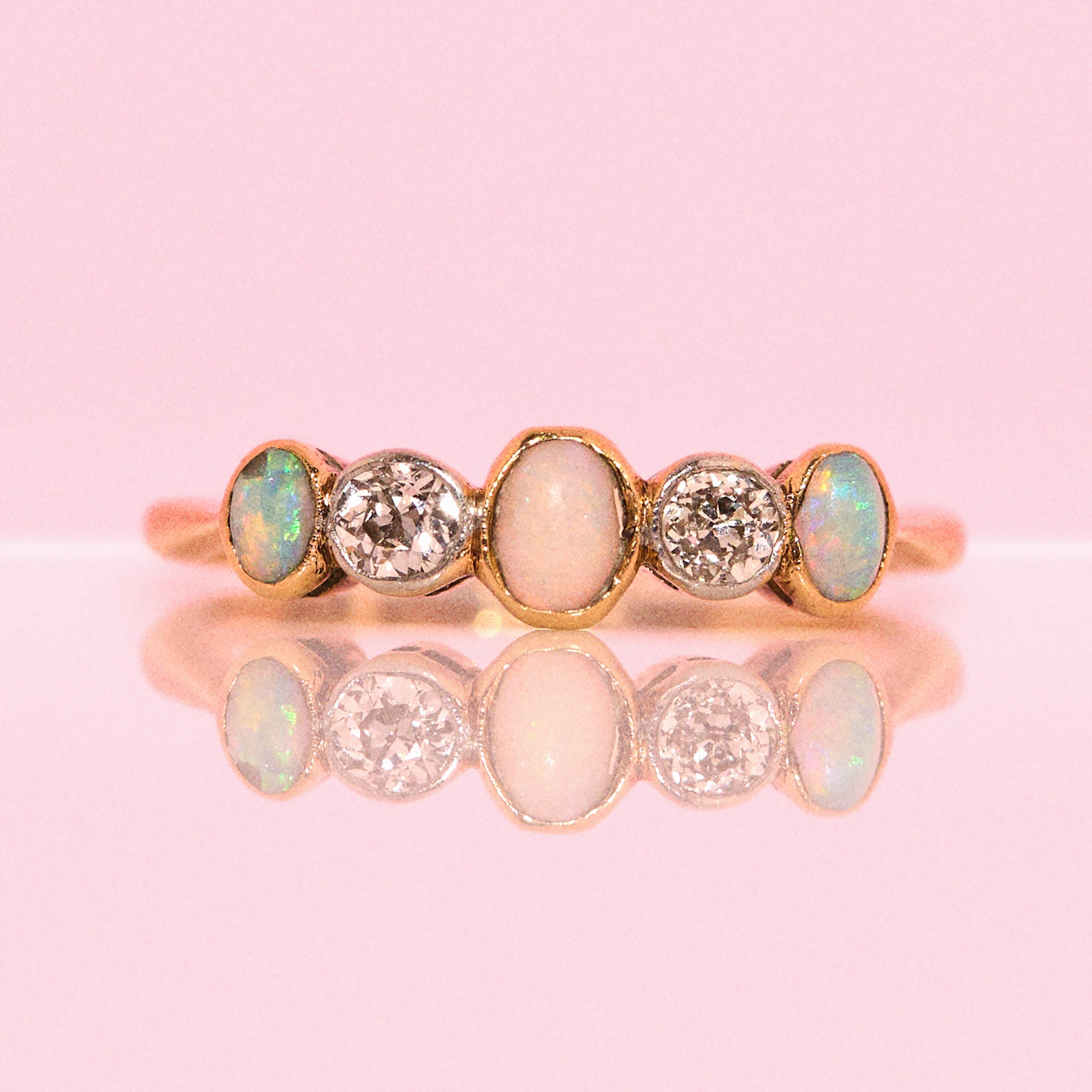 18ct gold art deco bezel set opal and diamond half eternity ring