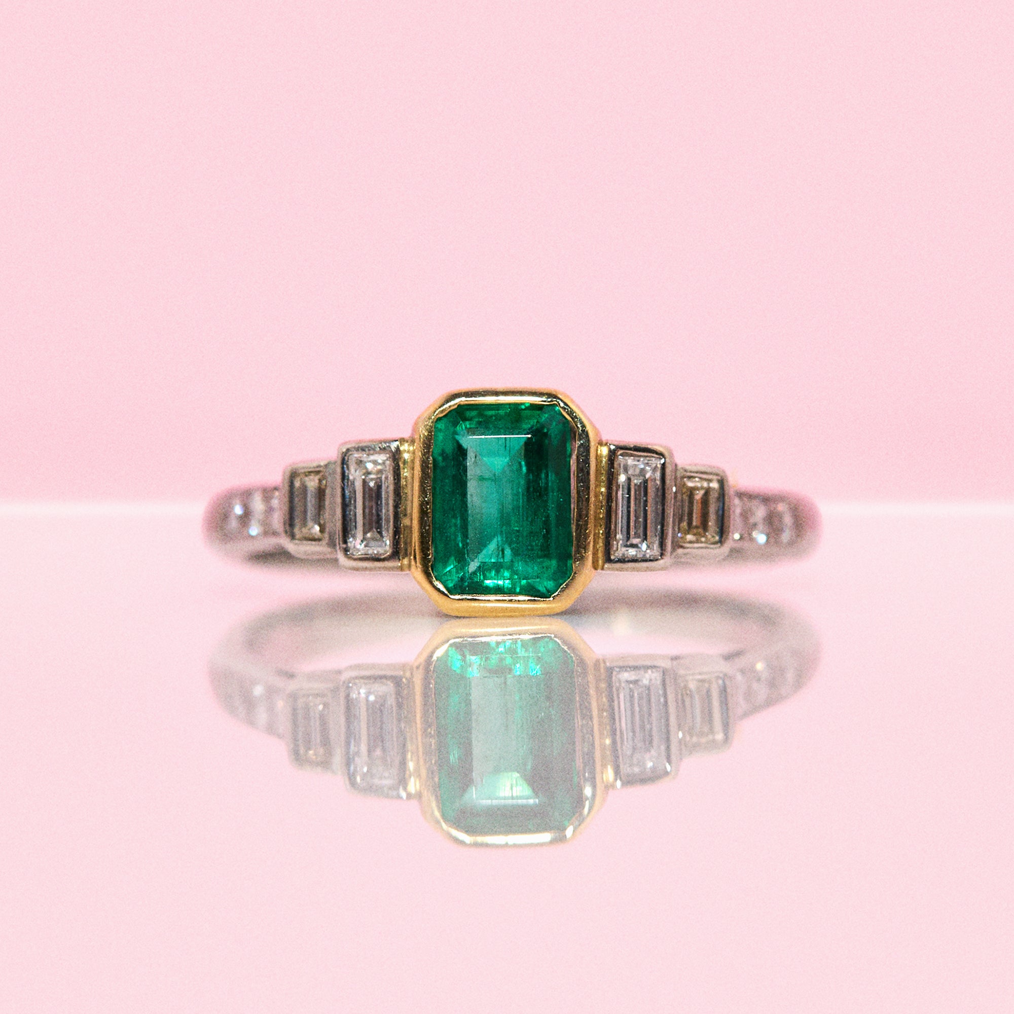 18ct white gold bezel set emerald and diamond ring