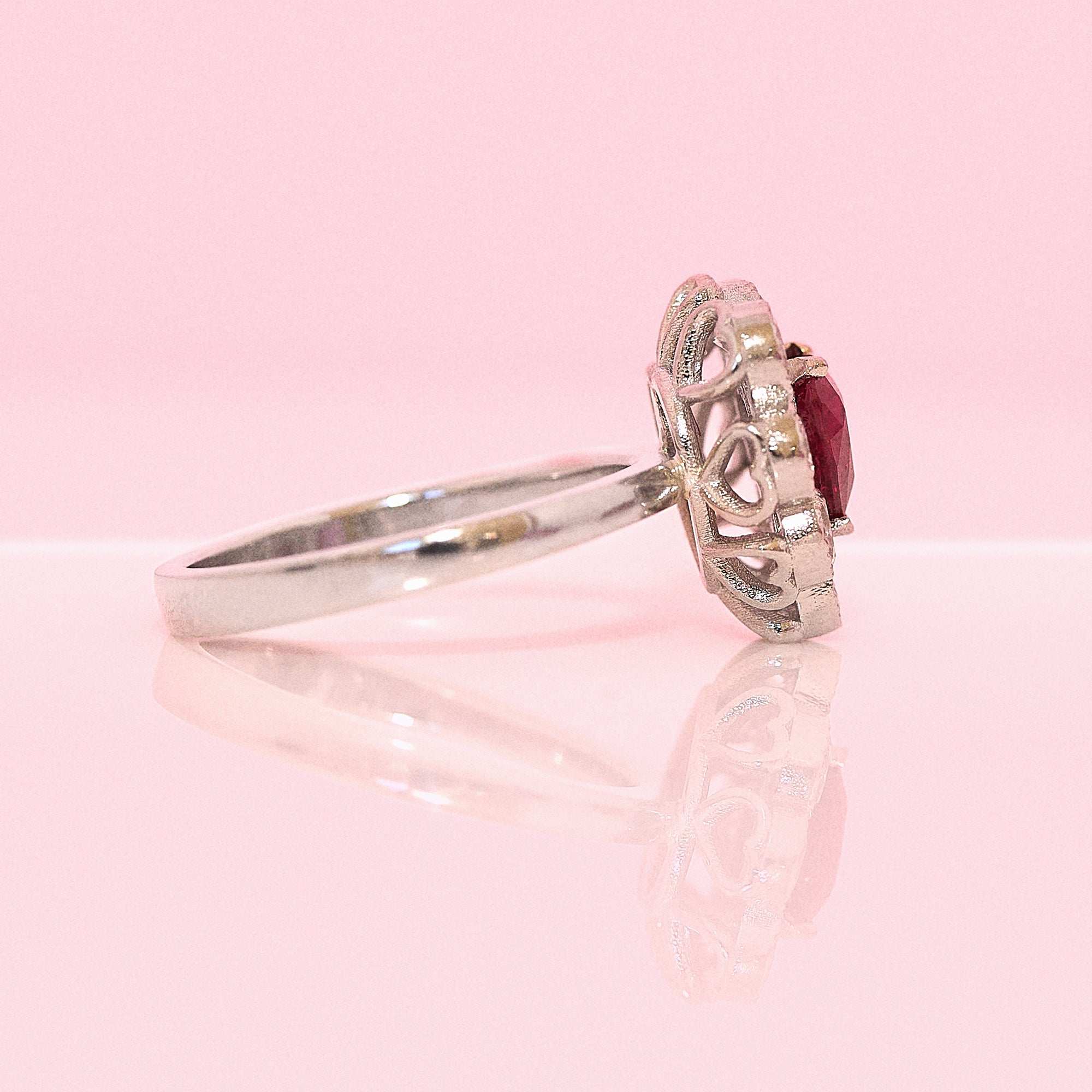 Platinum heart-shaped ruby and diamond vintage earring conversion ring