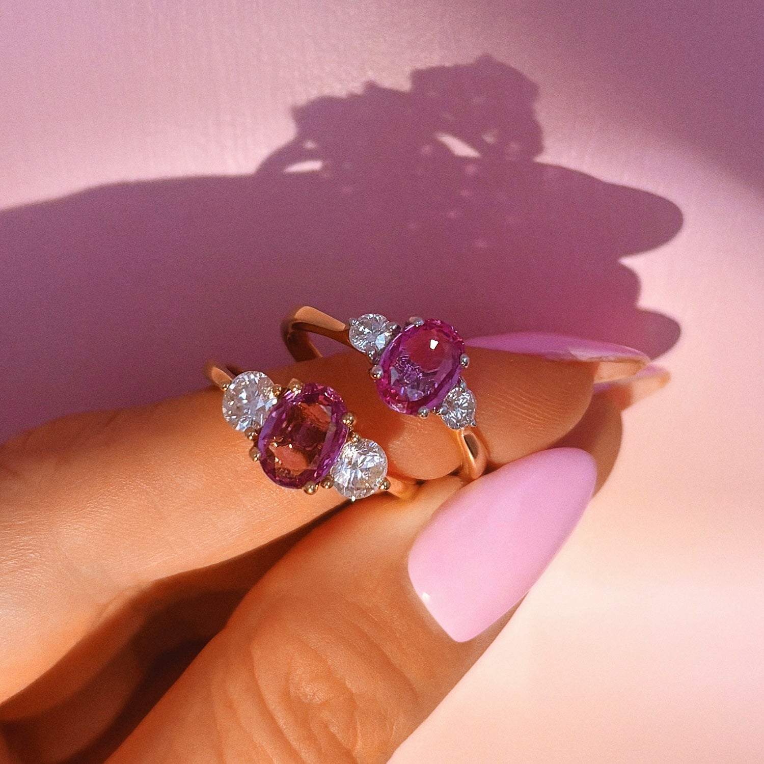 18ct gold 1.22ct pink sapphire and 0.25ct diamond three stone ring