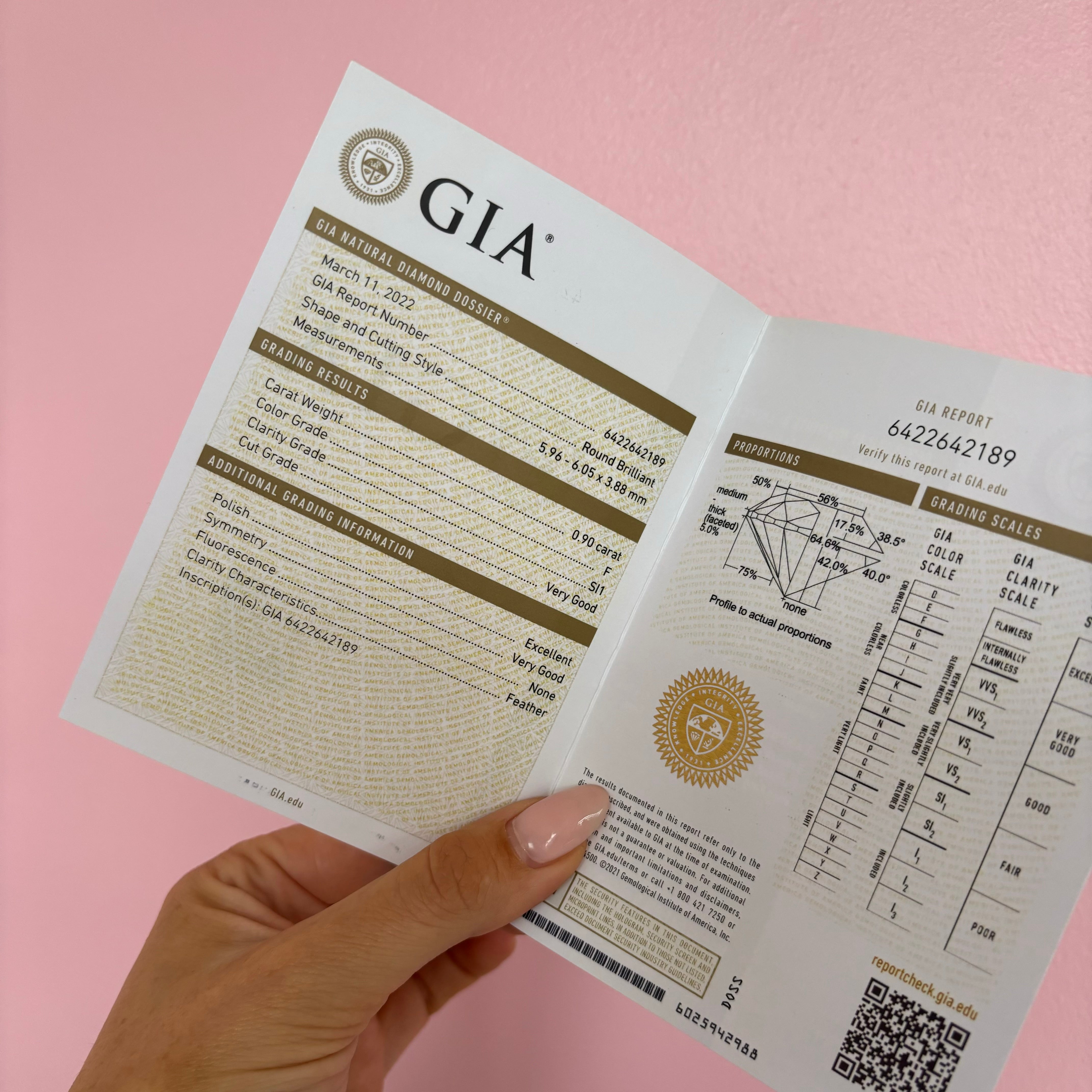 18ct gold 0.90ct round cut centre and two heart shaped diamond ‘Hidden Hearts’ ring