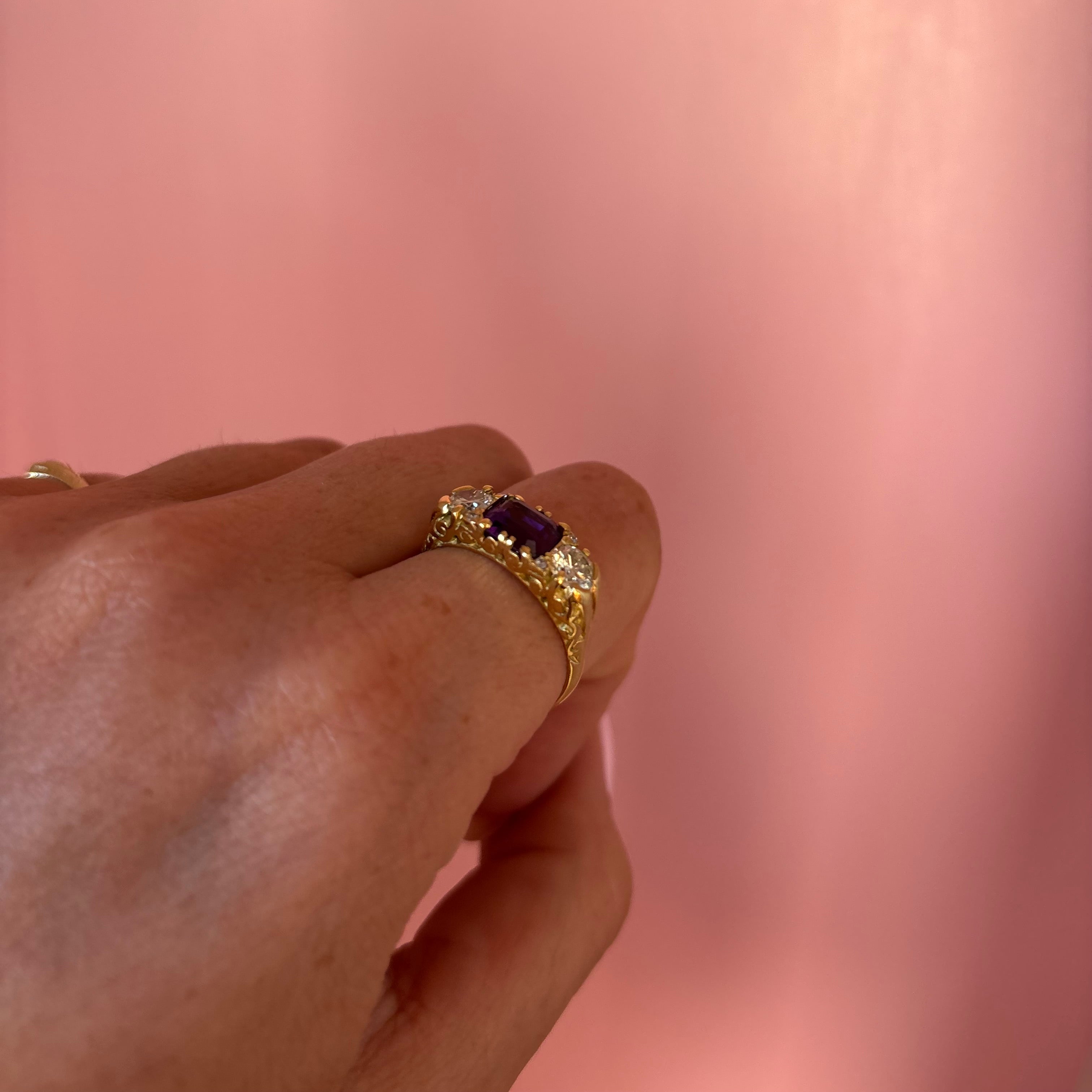 Vintage 18ct gold east to west amethyst and diamond carved ring