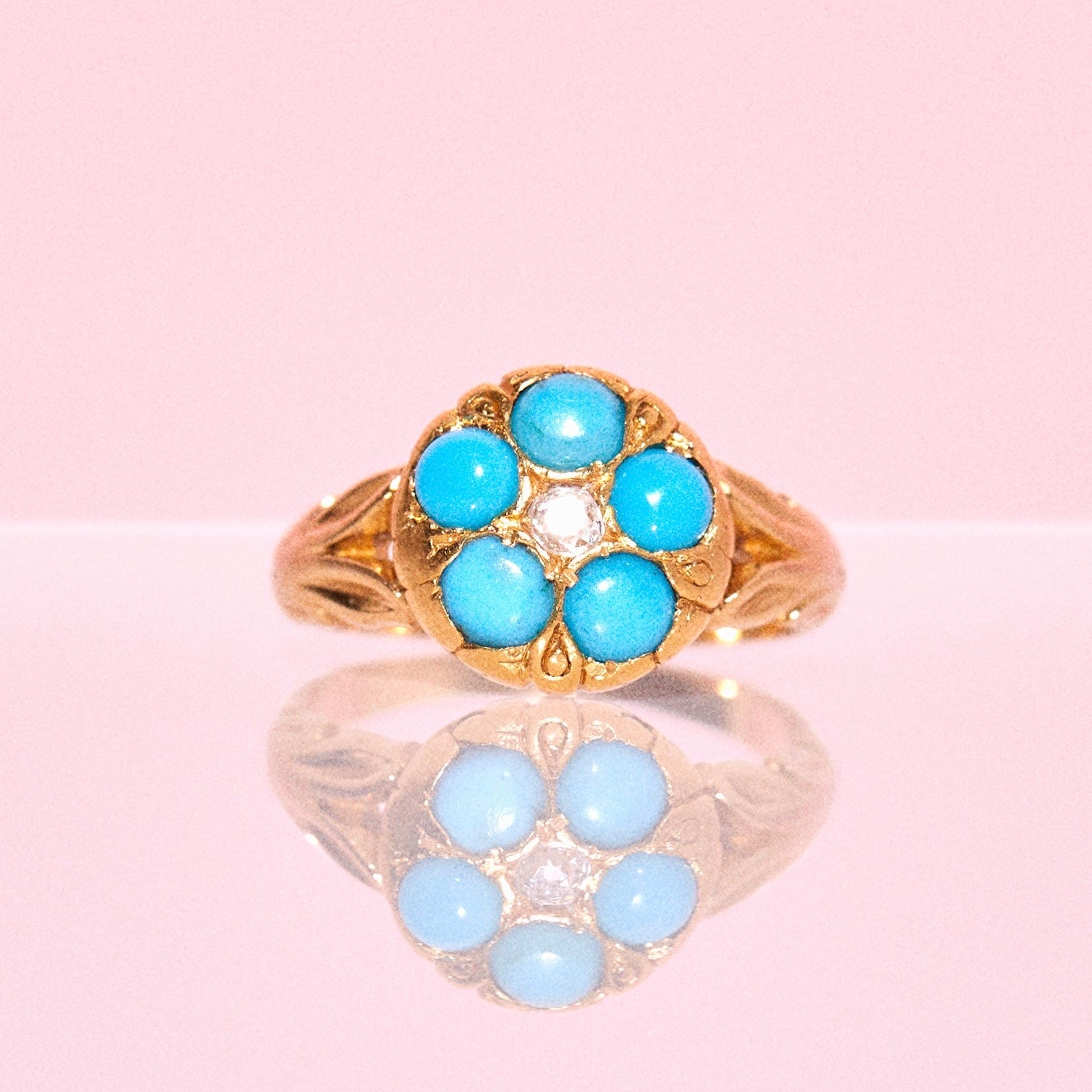 18ct gold turquoise and a diamond flower ring