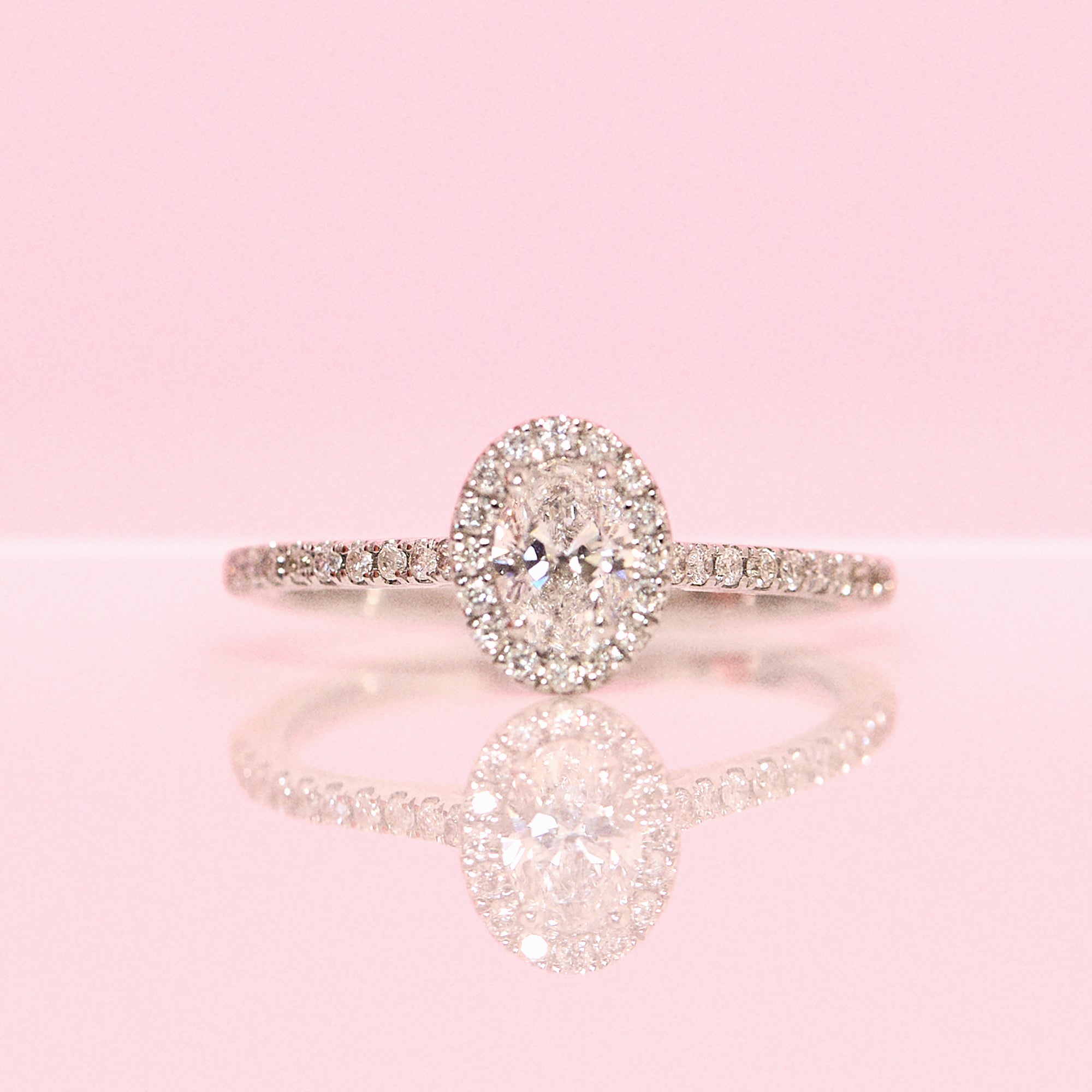 18ct white gold 0.50ct oval half-eternity diamond ring