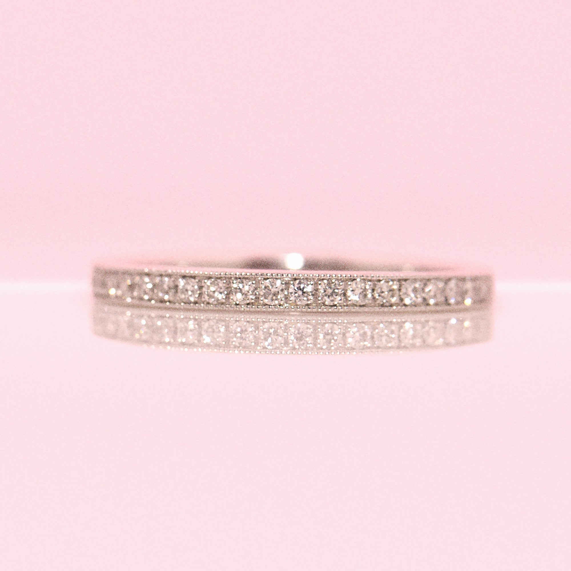 Platinum 0.20ct diamond half-eternity ring