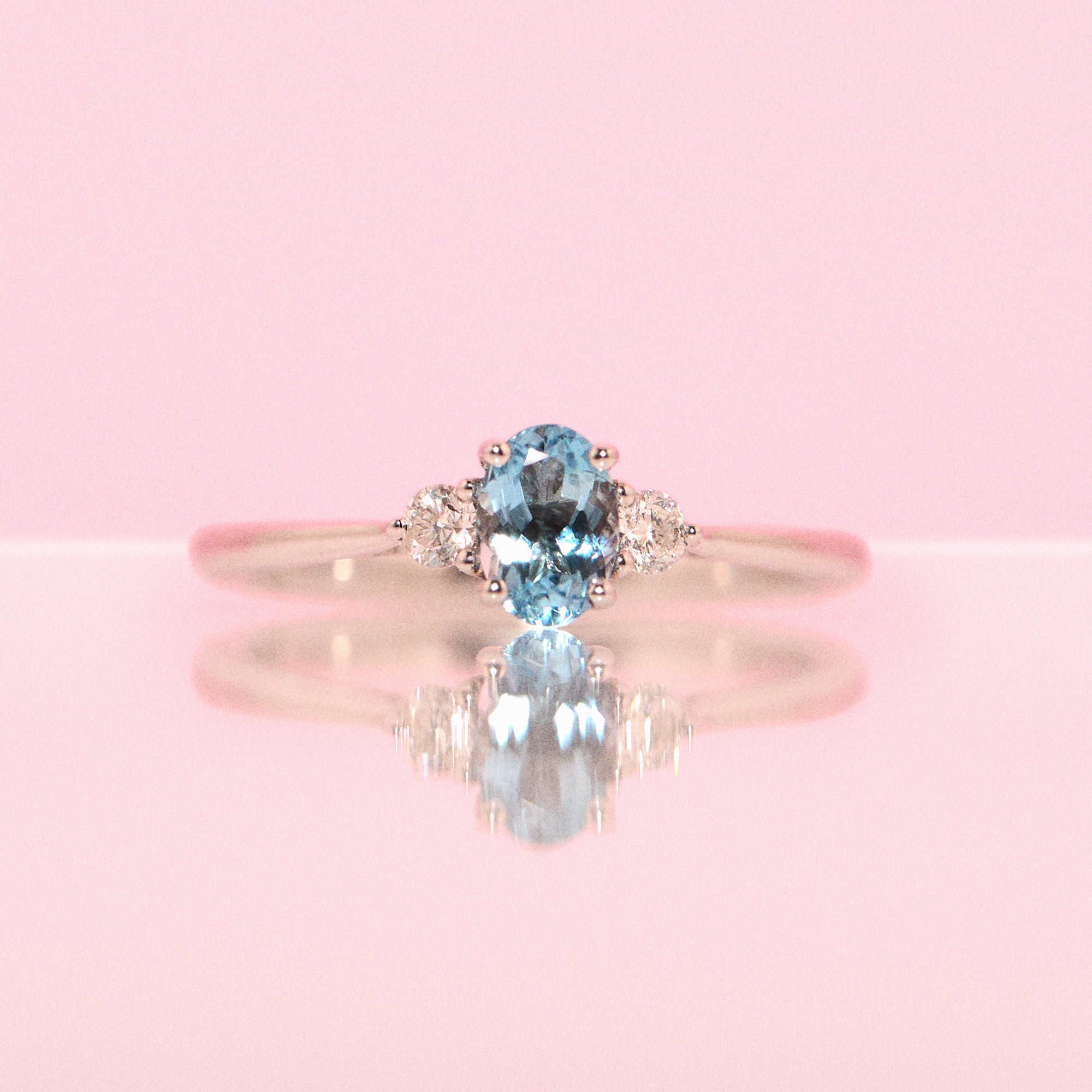 9ct white gold aquamarine and diamond three stone ring (made to order)