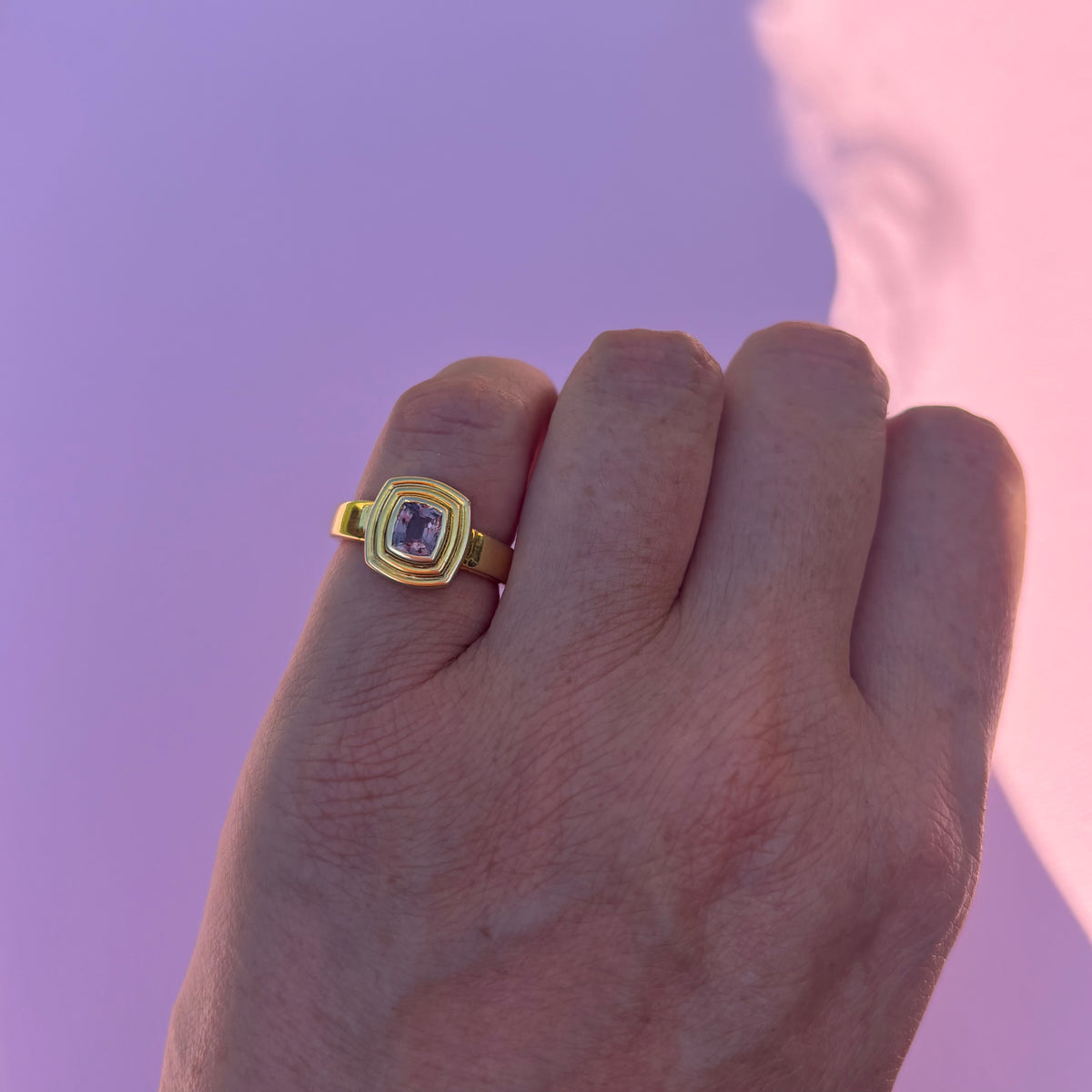 14ct gold plum mauve sapphire bezel set ring