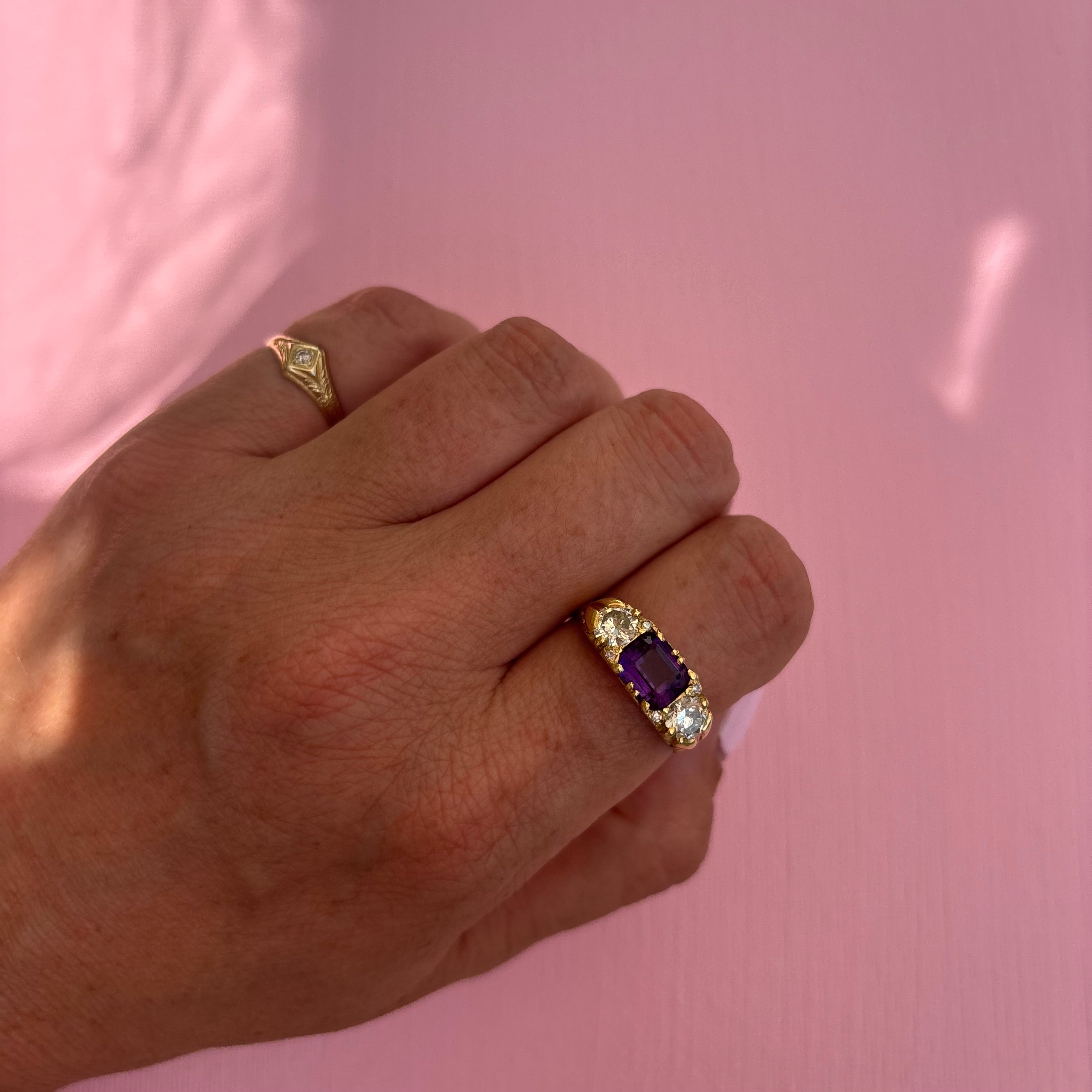 Vintage 18ct gold east to west amethyst and diamond carved ring