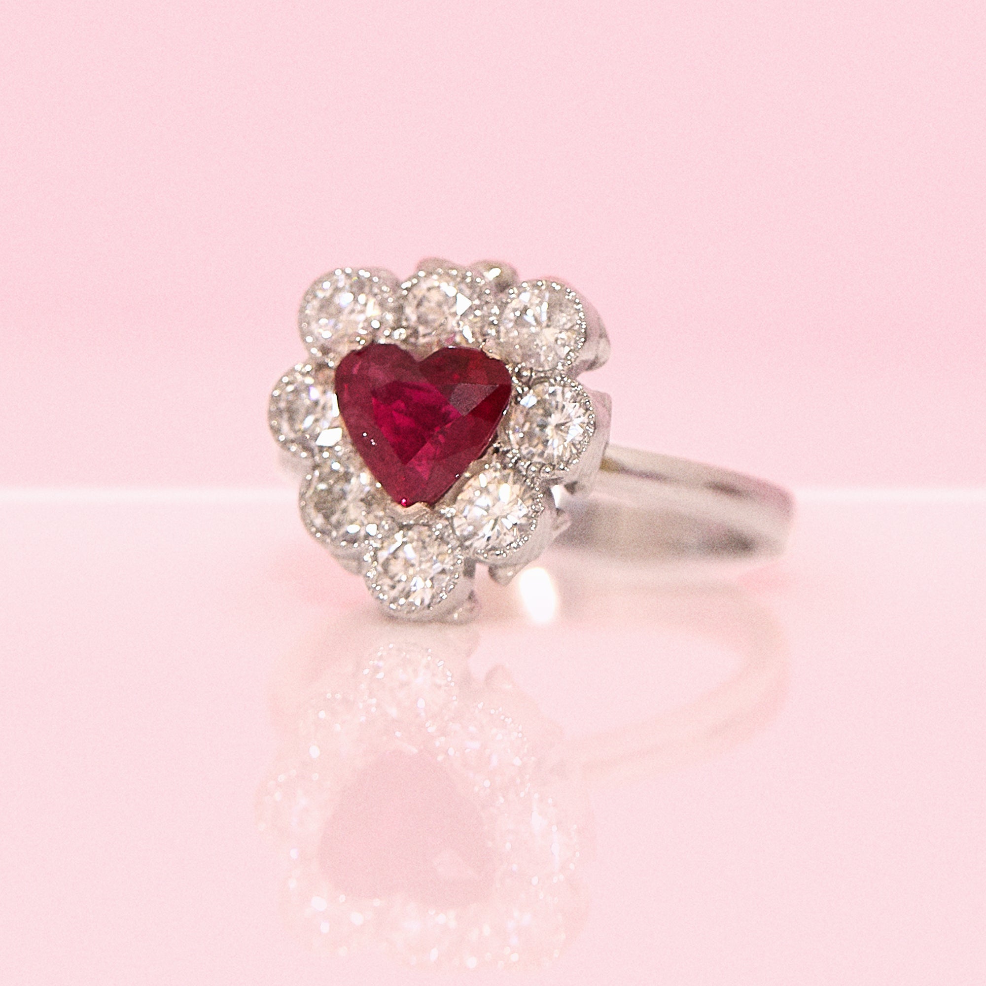 Platinum heart-shaped ruby and diamond vintage earring conversion ring