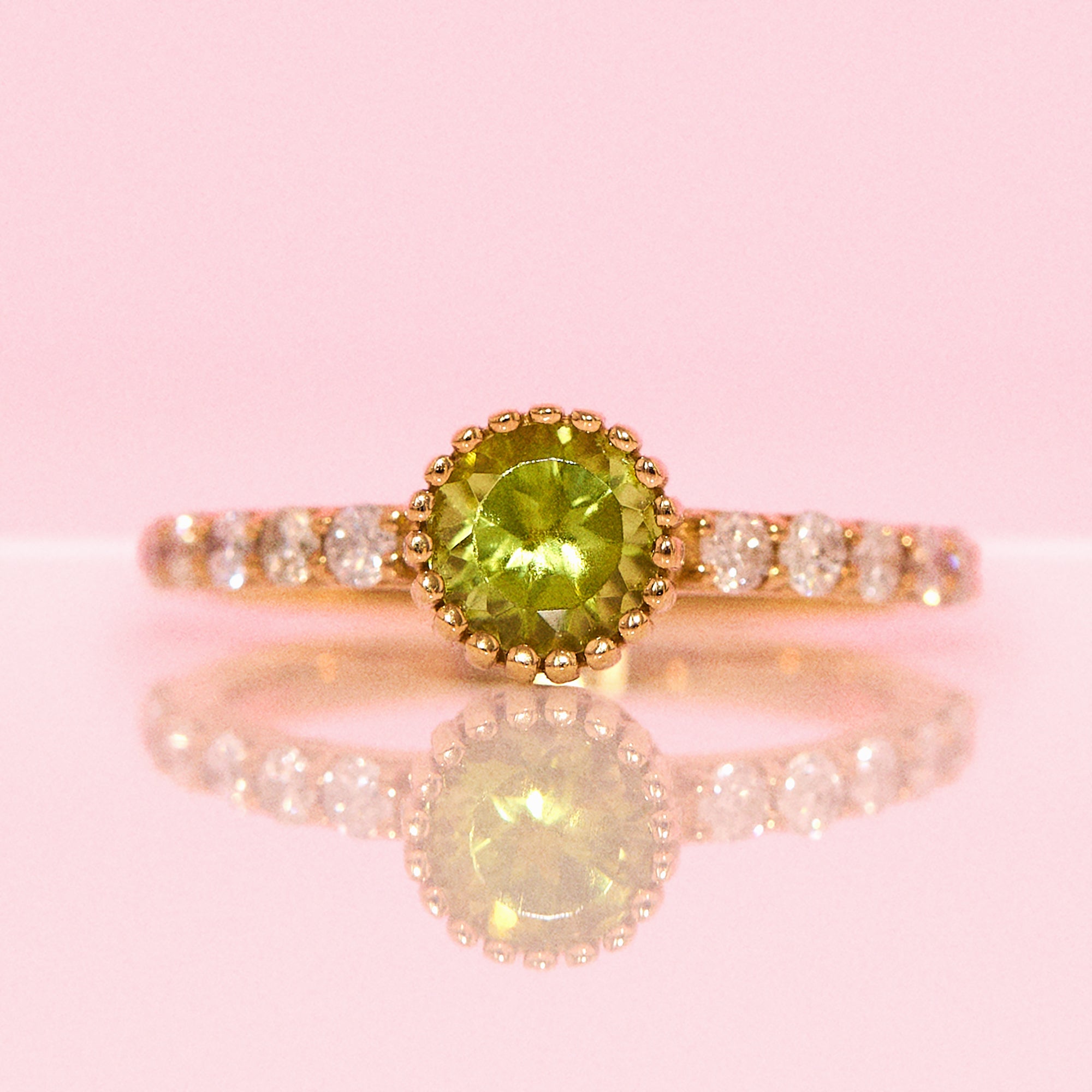 18ct gold peridot and diamond half eternity ring
