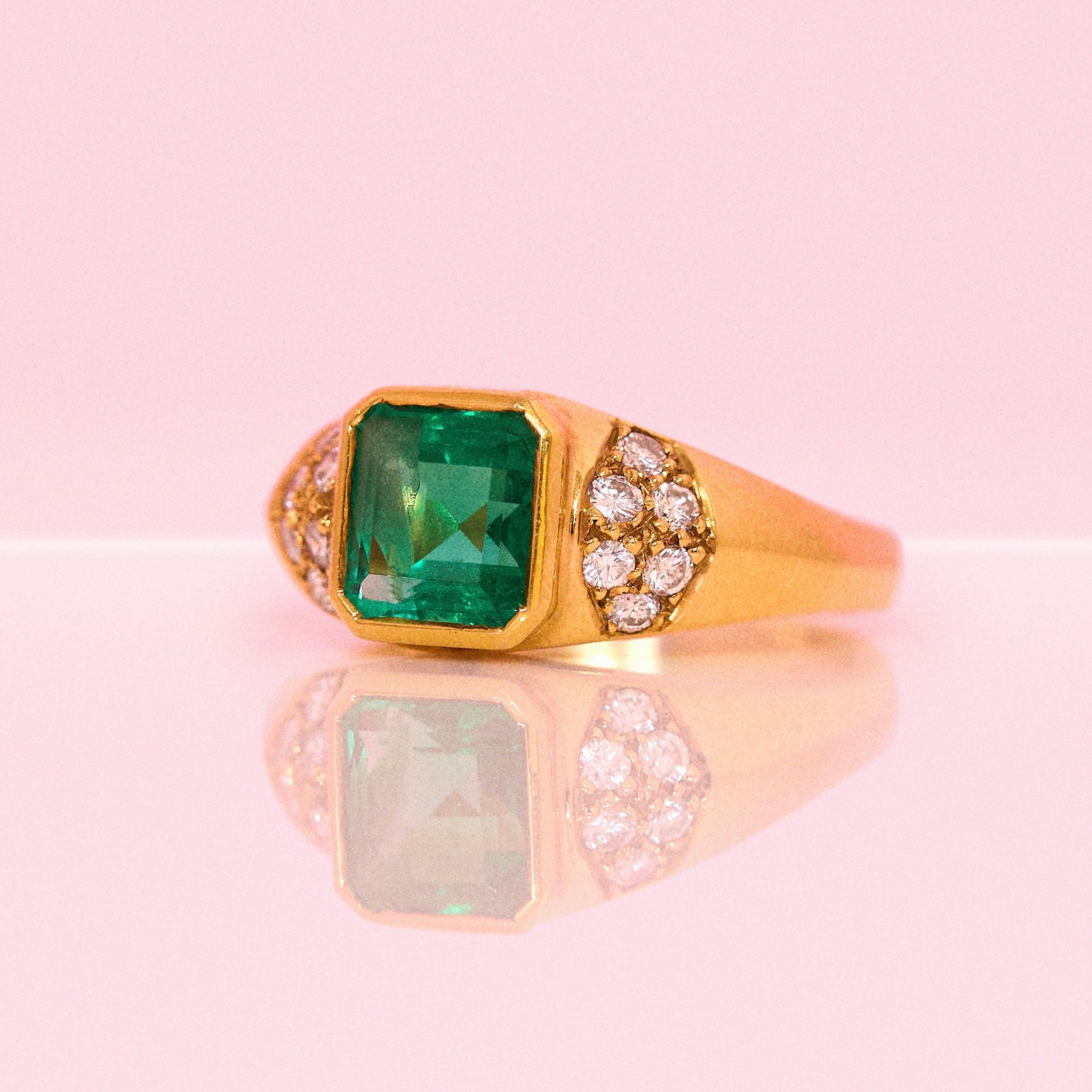 18ct gold emerald and diamond ring