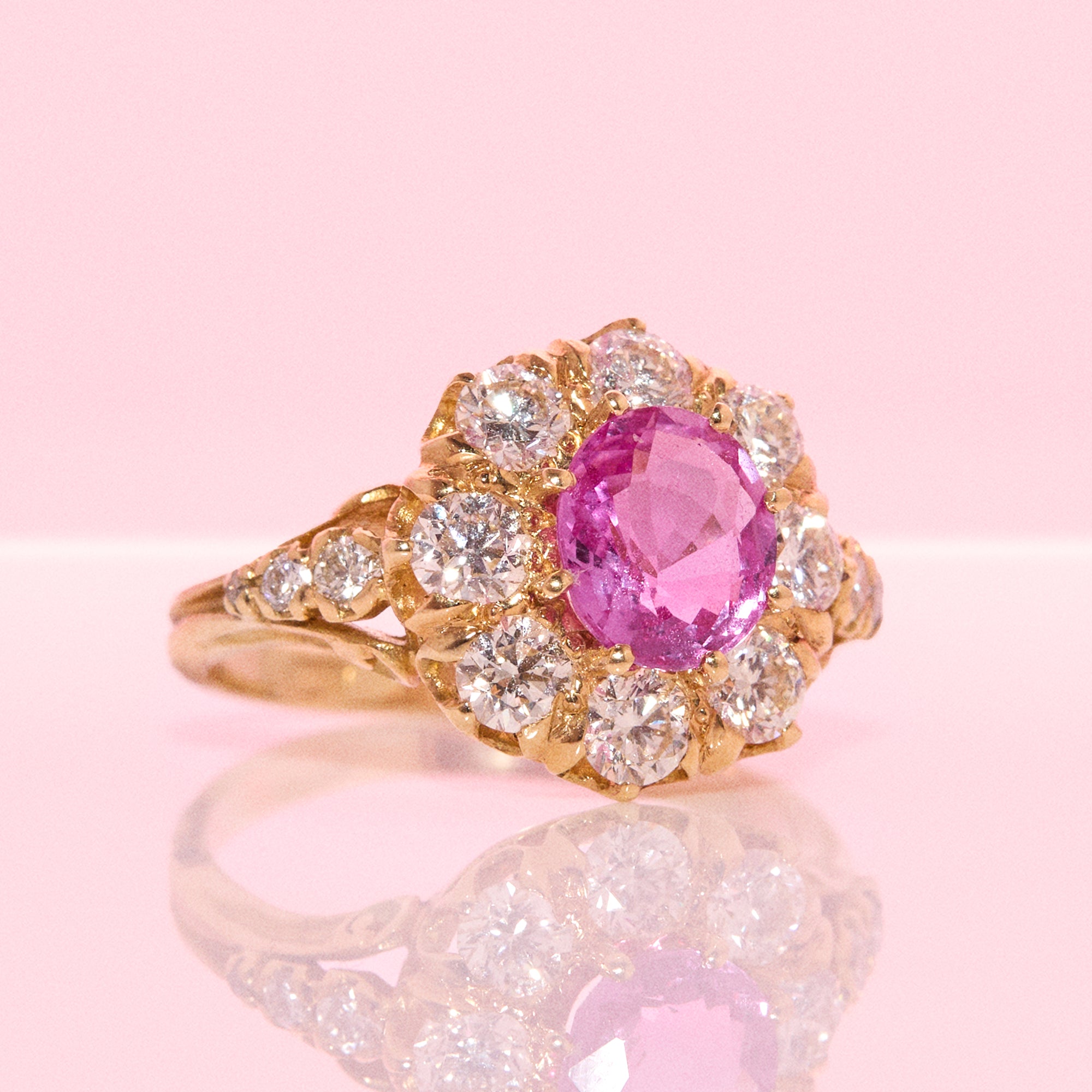 Vintage 18ct gold 1.16ct oval pink sapphire and 1.0ct diamond cluster ring