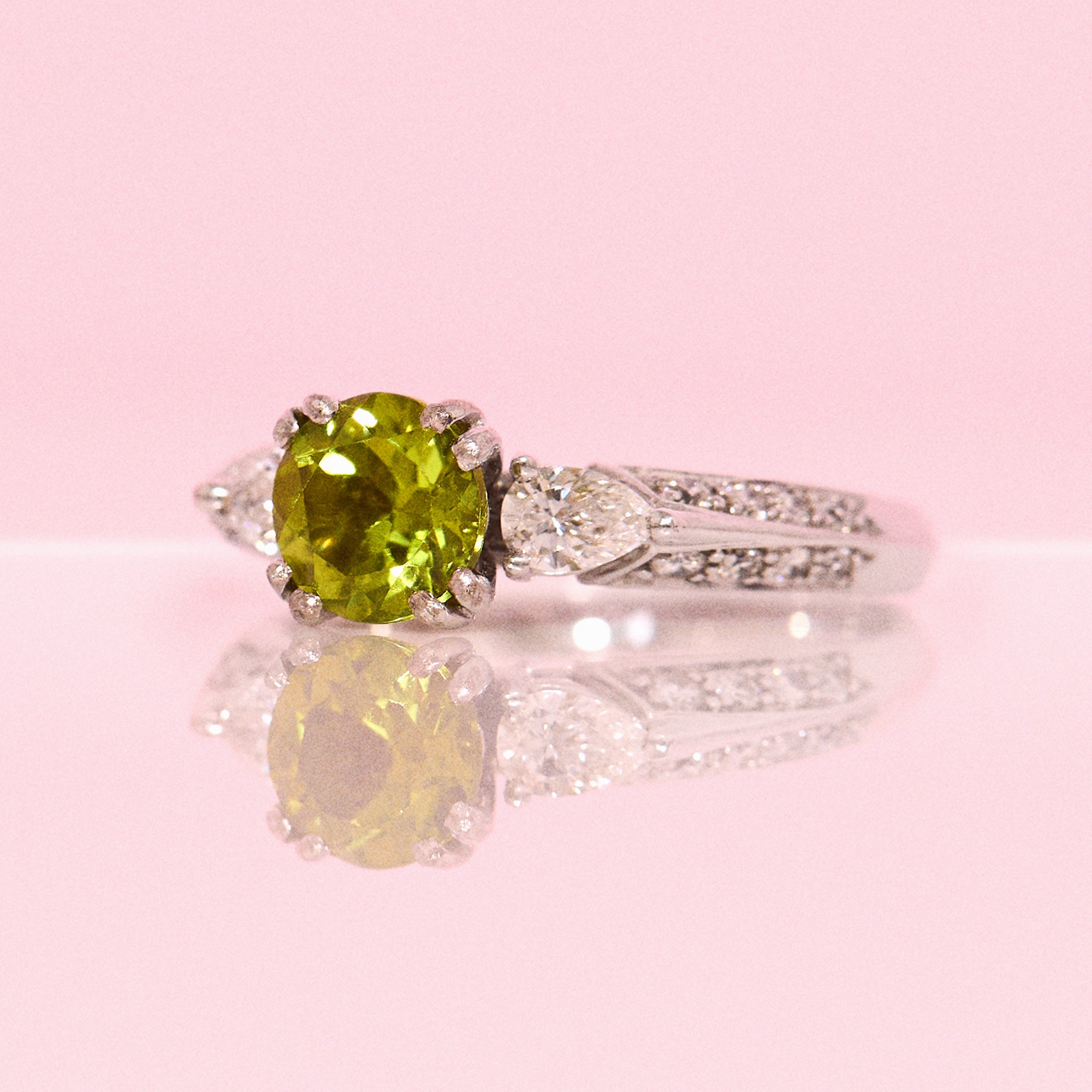 18ct white gold peridot and pear diamond ring