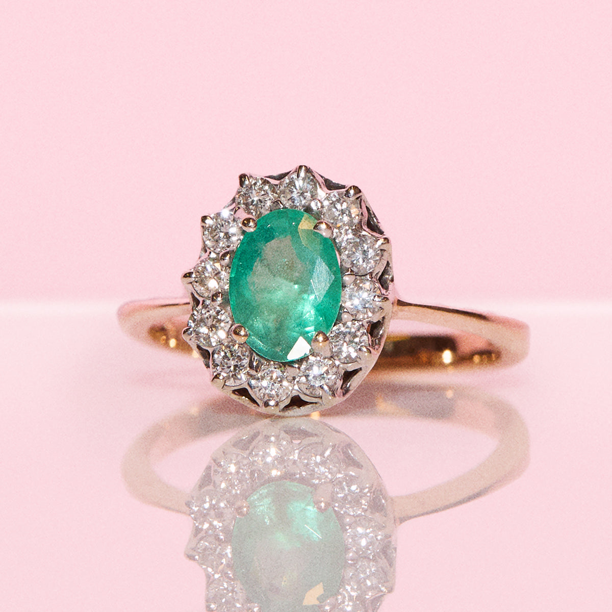 Vintage 14ct gold 1ct emerald and 0.24ct diamond cluster ring
