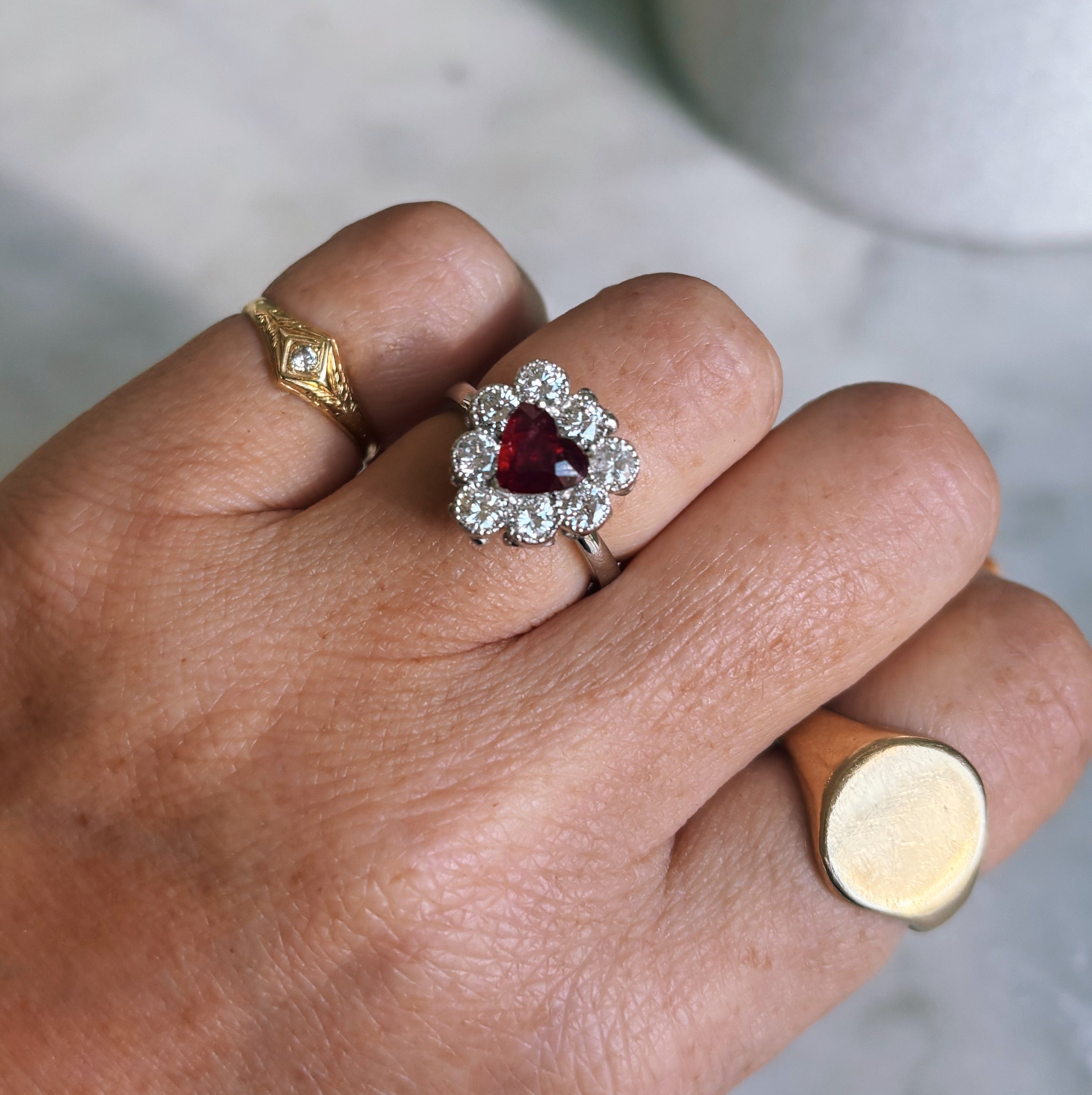 Platinum heart-shaped ruby and diamond vintage earring conversion ring
