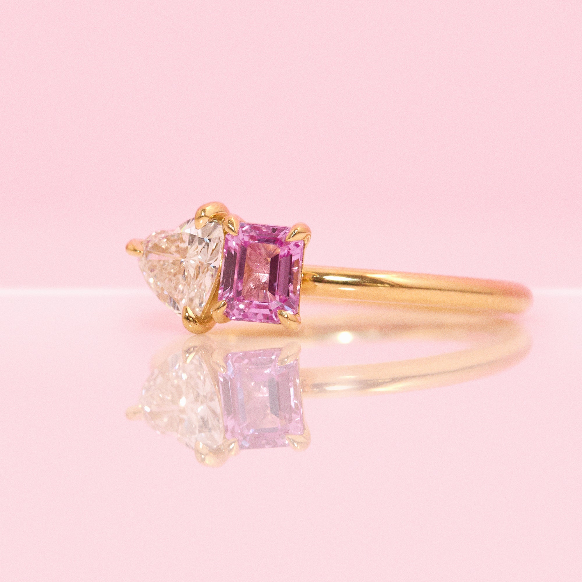 18ct gold ‘toi et moi’ 0.46ct heart-shaped diamond and 0.60ct pink sapphire ring (made to order)