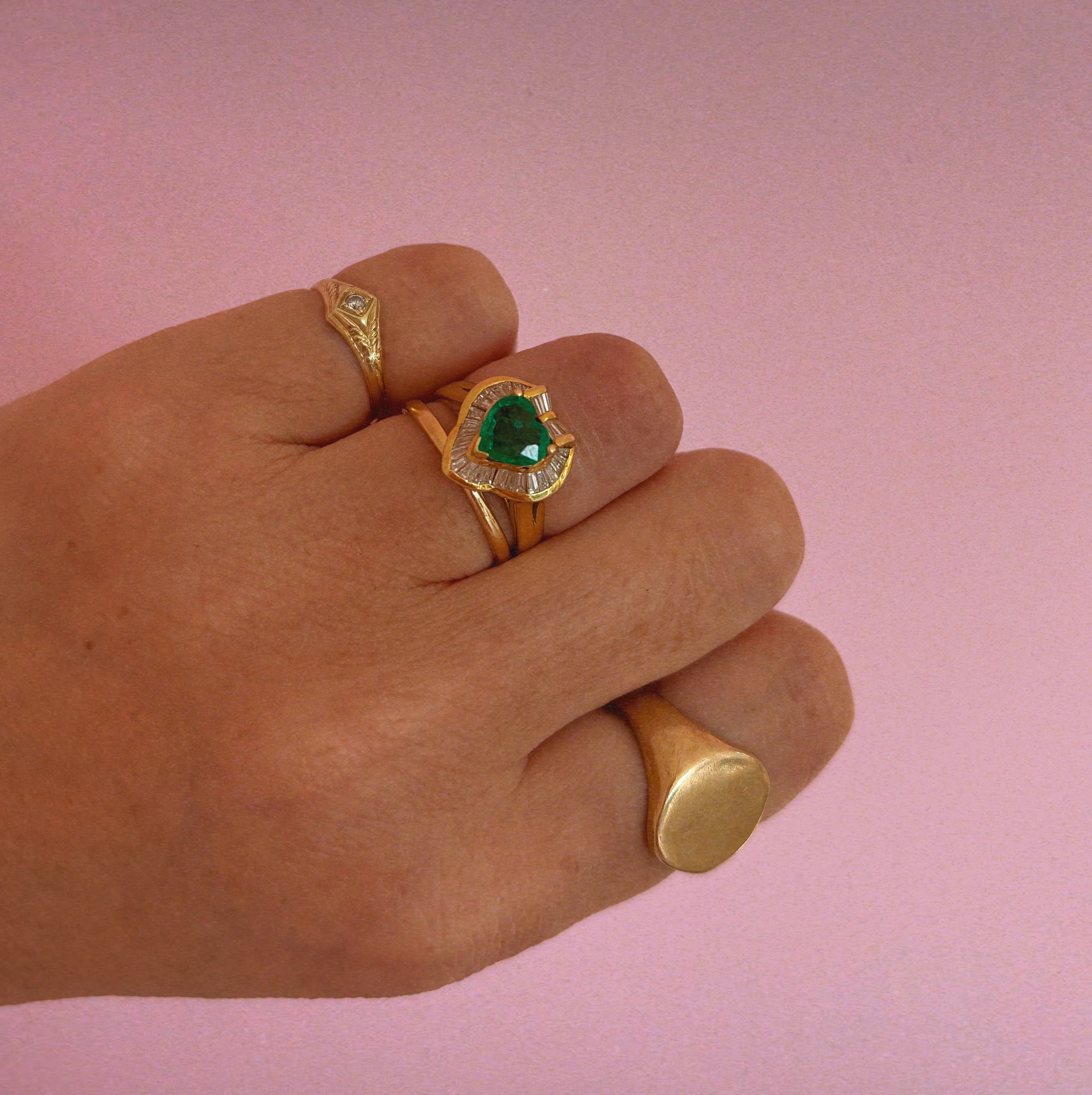 18ct gold heart shaped emerald and baguette diamond ring