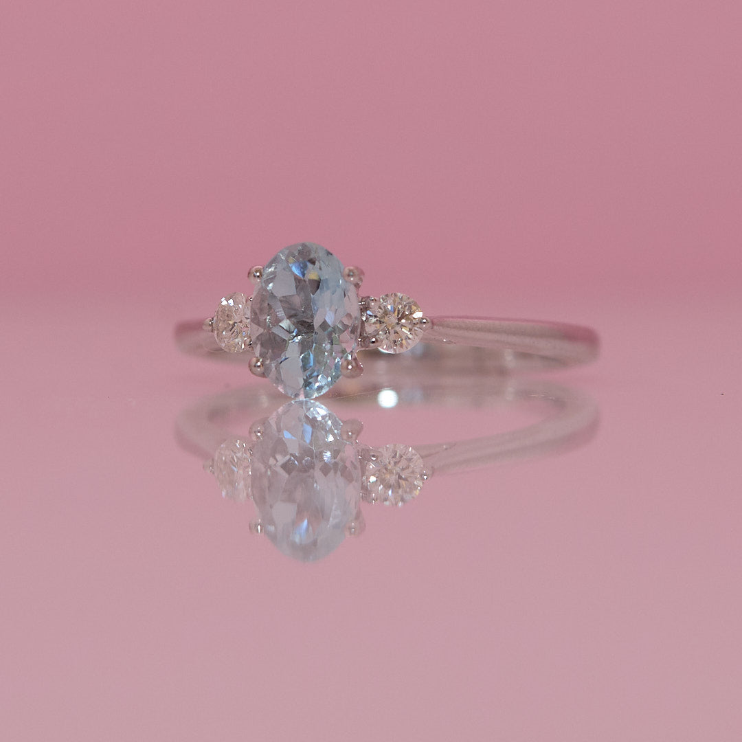 9ct white gold 1.03ct aquamarine and 0.16ct diamond three stone ring