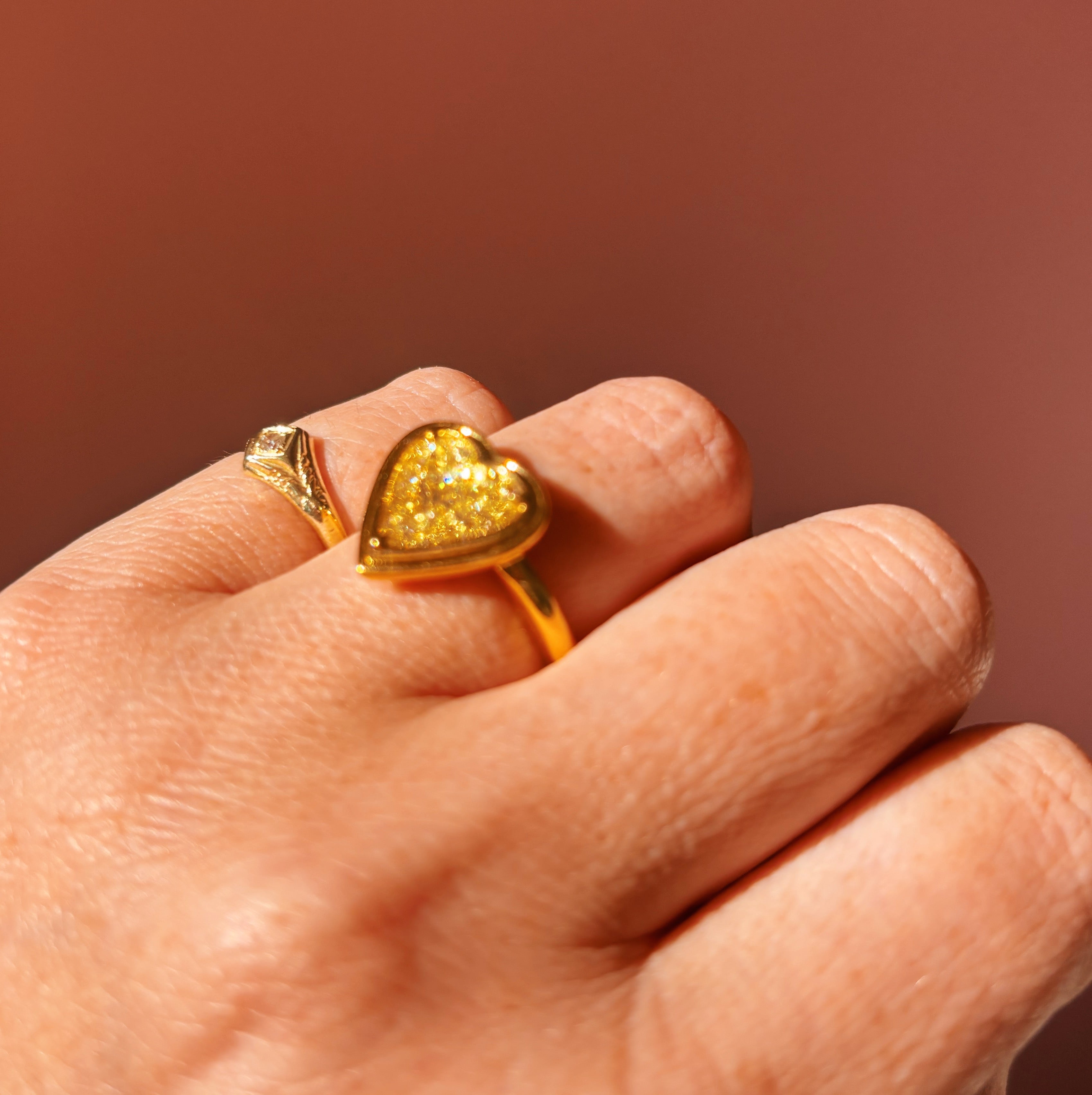 18ct gold bezel set fancy yellow 2.35ct heart-shaped diamond ring