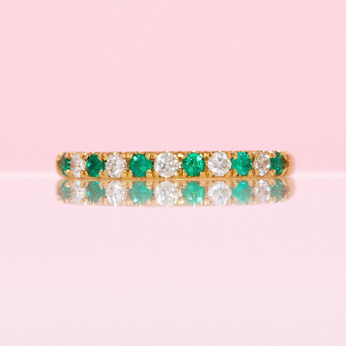 18ct yellow gold emerald and diamond half eternity ring