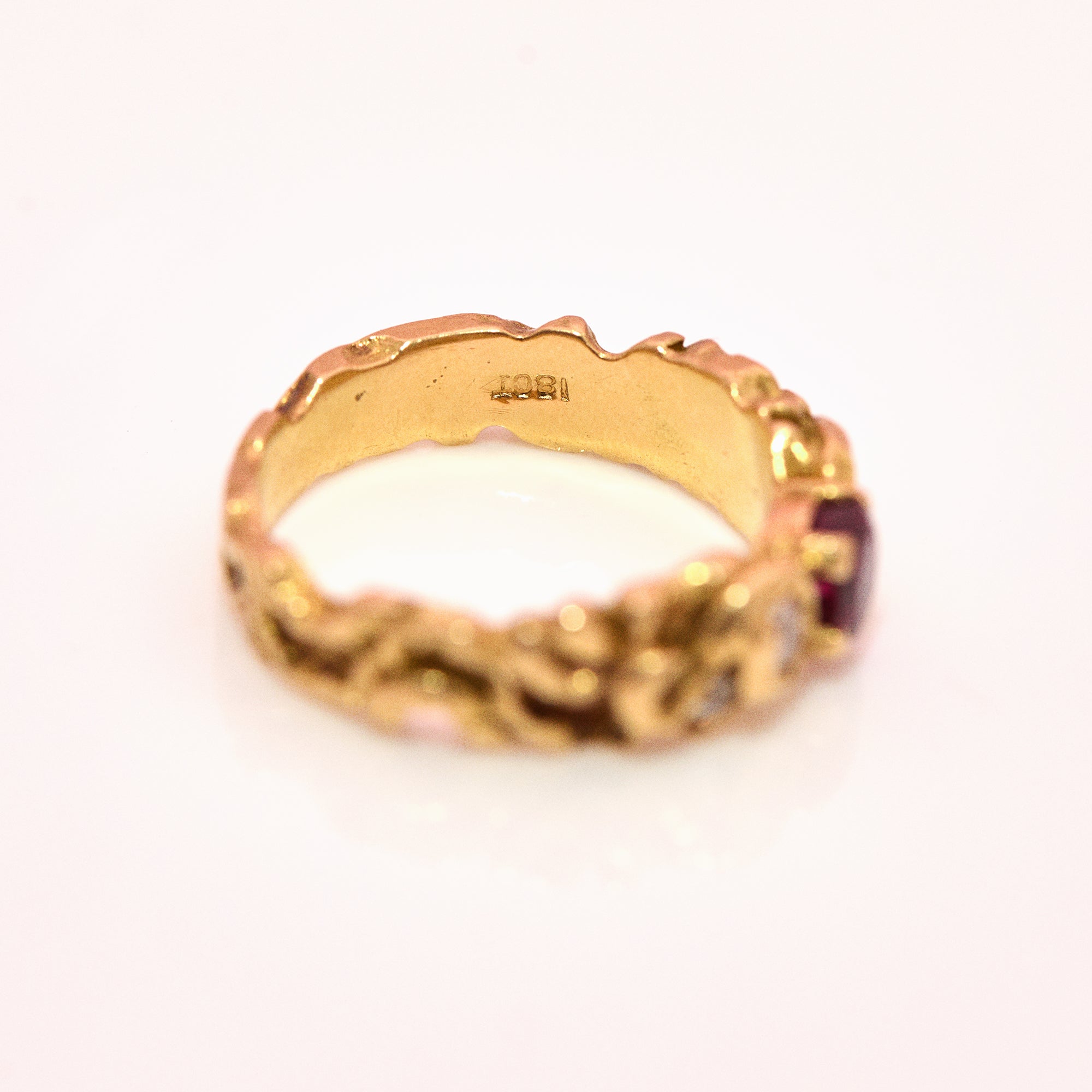 18ct gold ruby and diamond gypsy ring