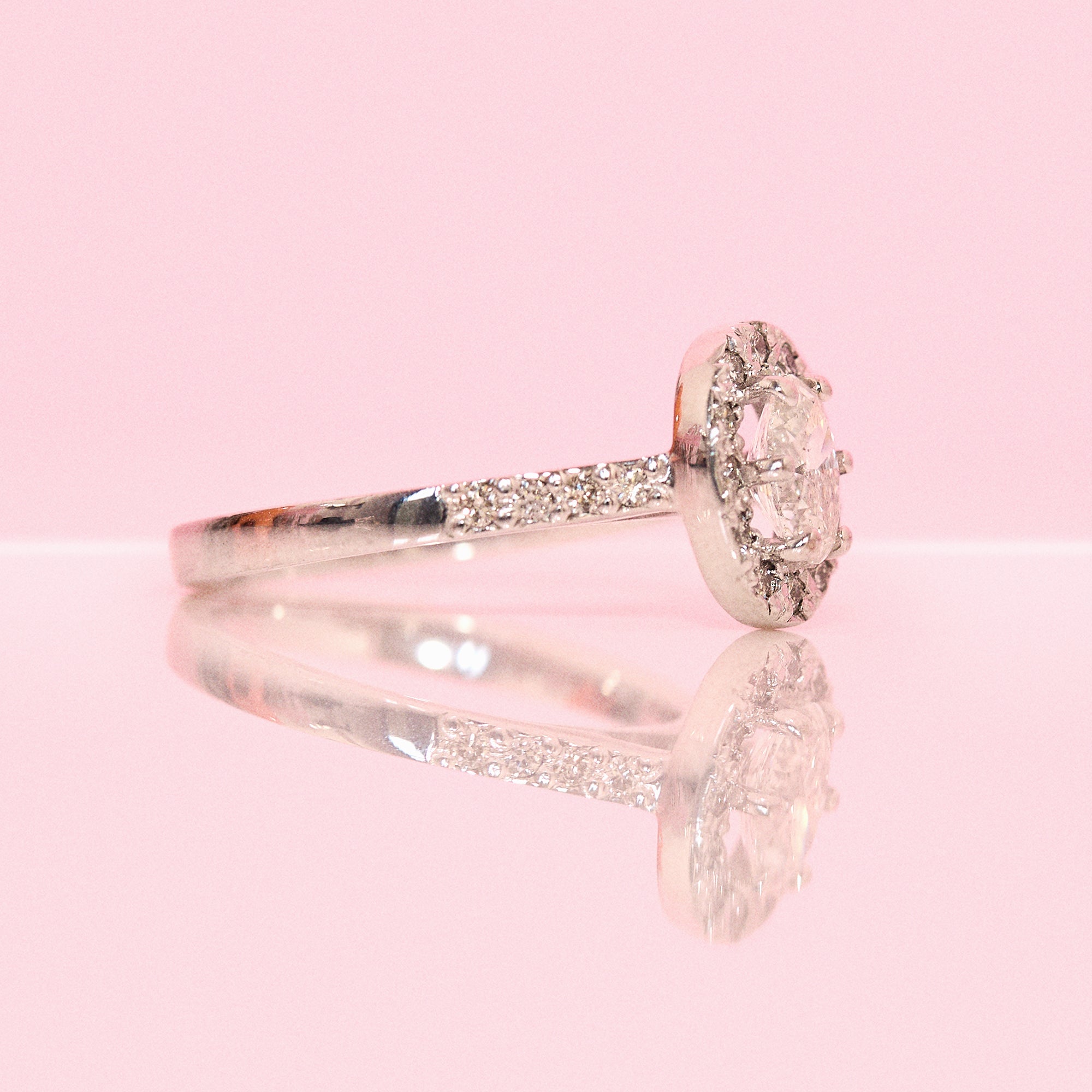 18ct white gold 0.75ct oval diamond cluster half-eternity ring