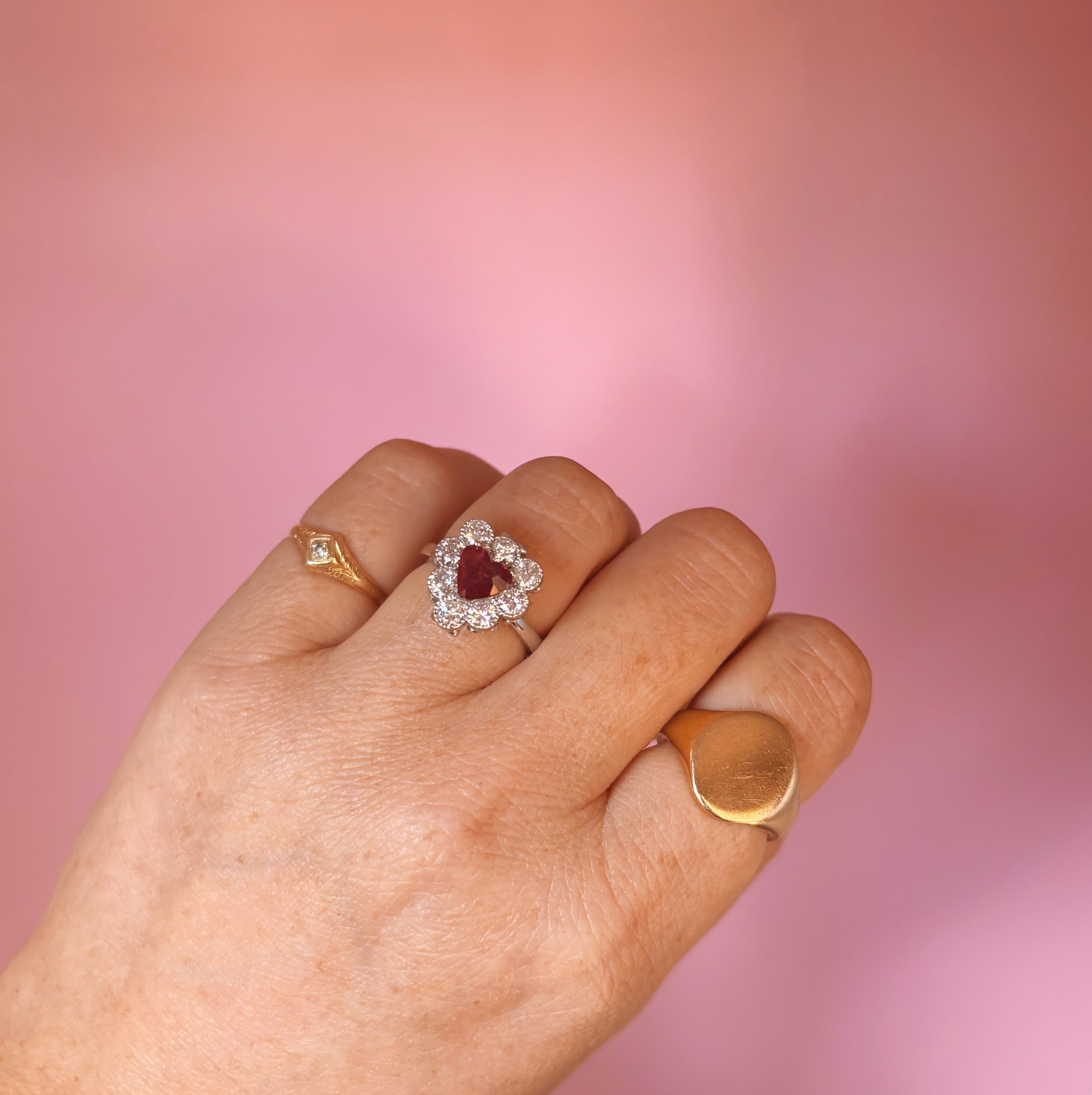 Platinum heart-shaped ruby and diamond vintage earring conversion ring