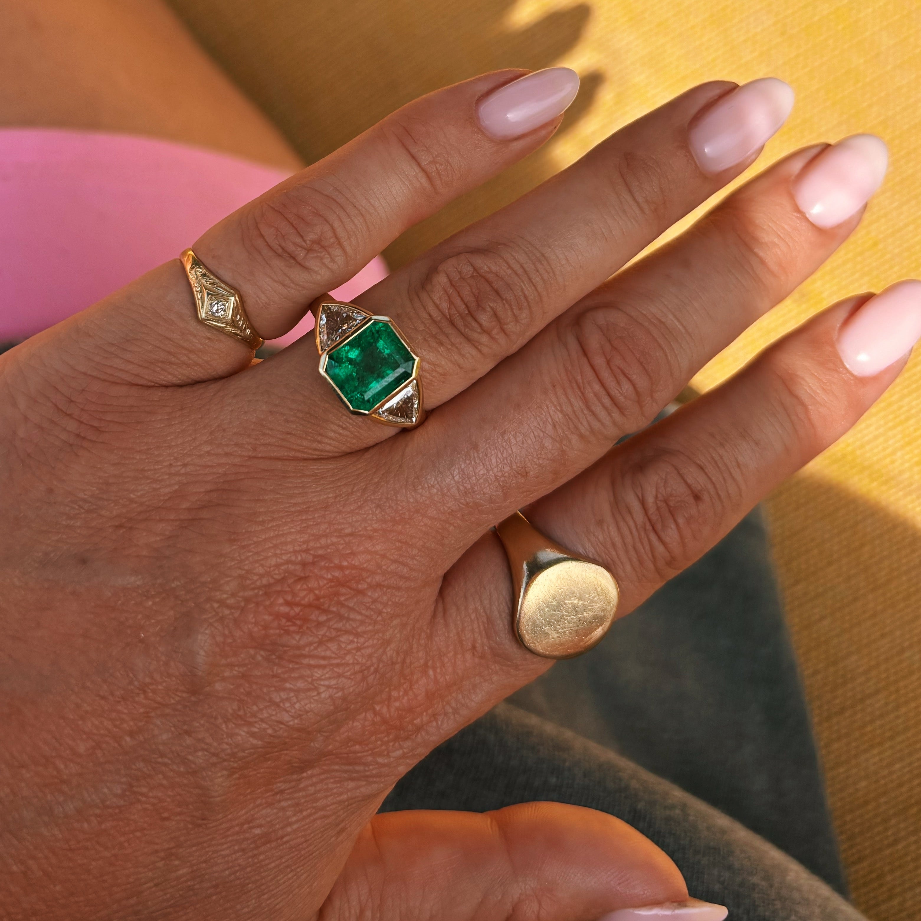 18ct gold 3.0ct Columbian Octagonal-cut emerald and 1.0ct diamond bezel set ring