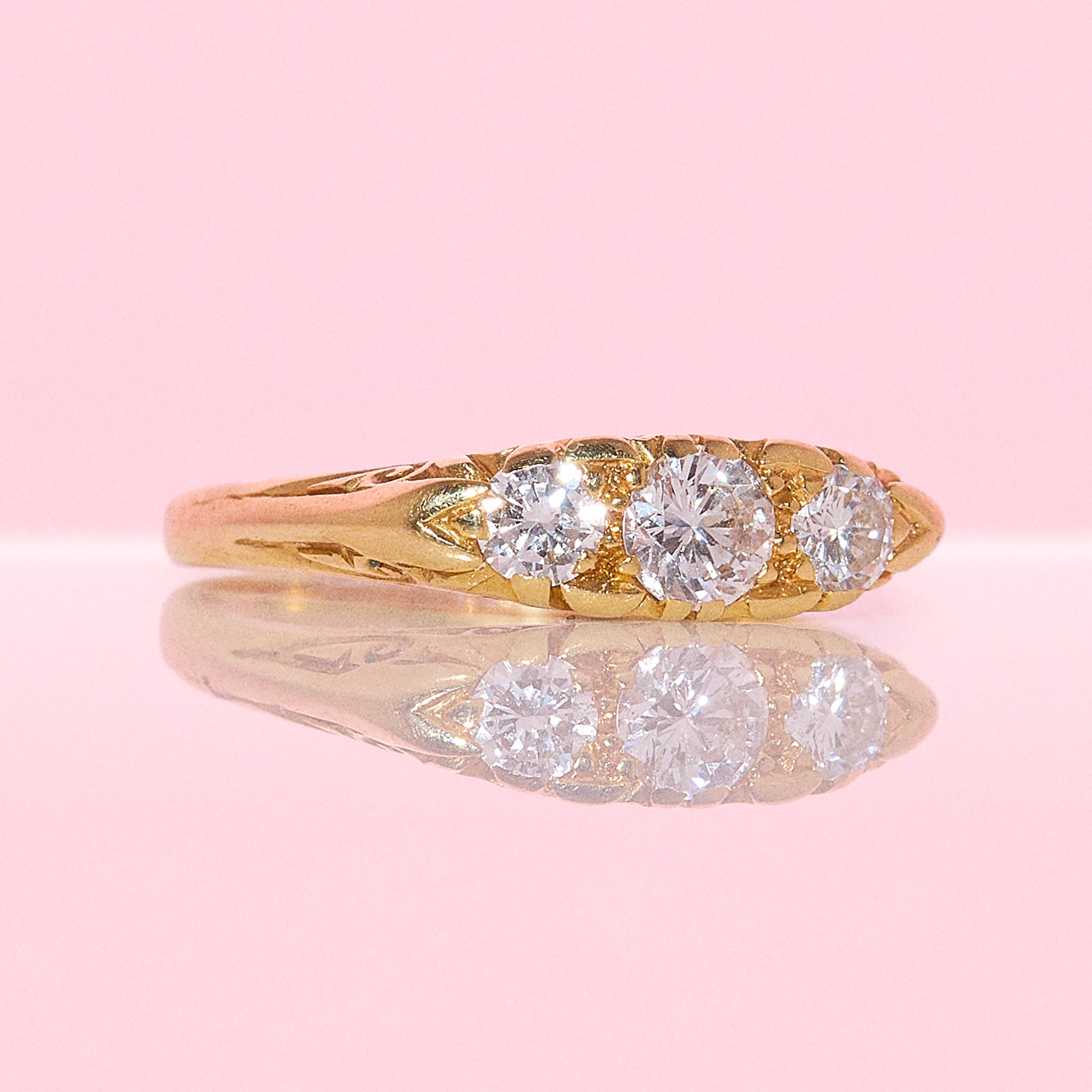 18ct gold diamond three stone carved ring from 1991