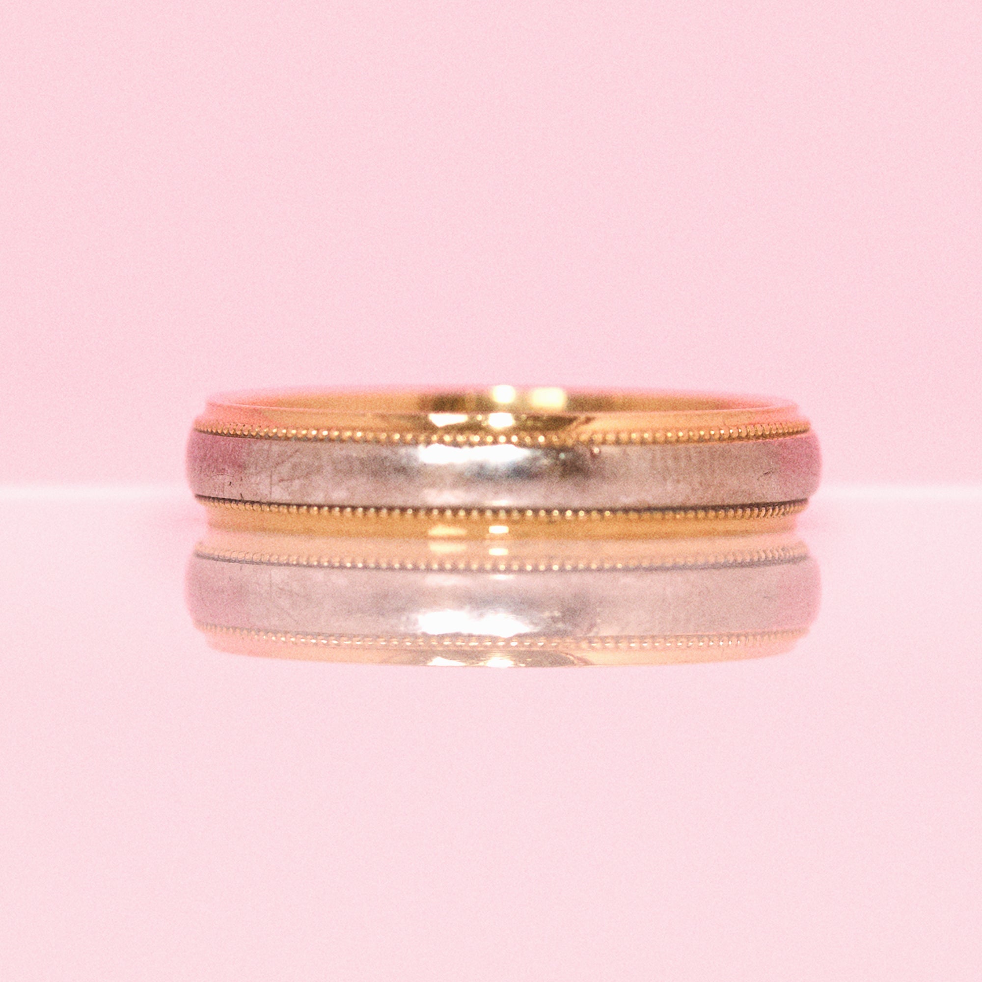 18ct gold two tone band with a beaded edge