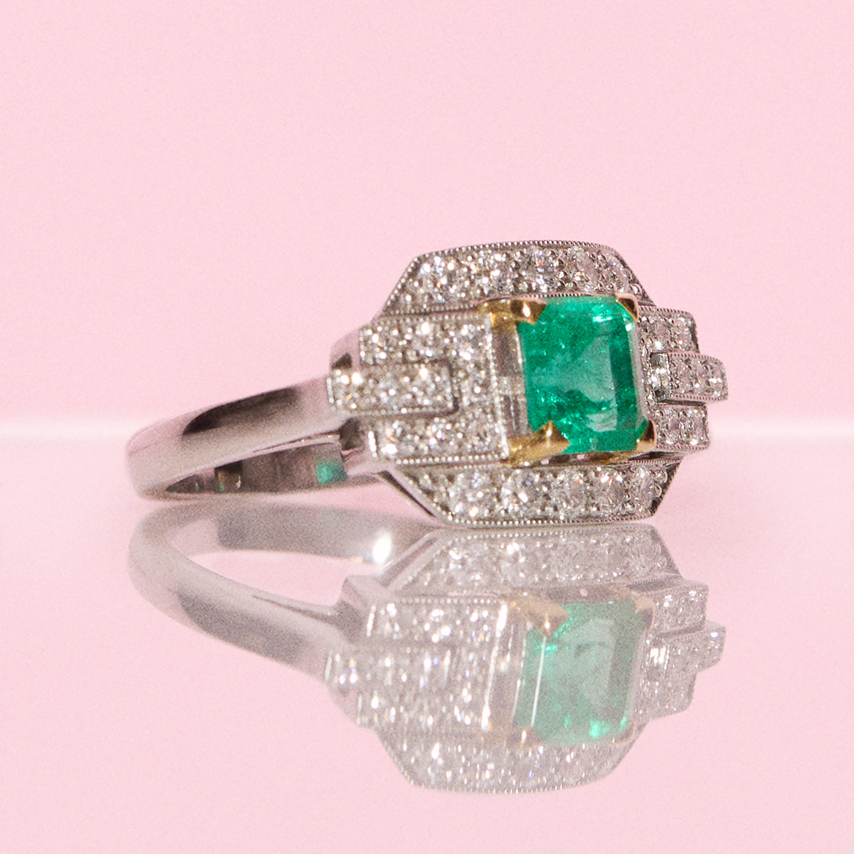 Vintage Platinum gold 0.75ct emerald and 0.50ct diamond ring