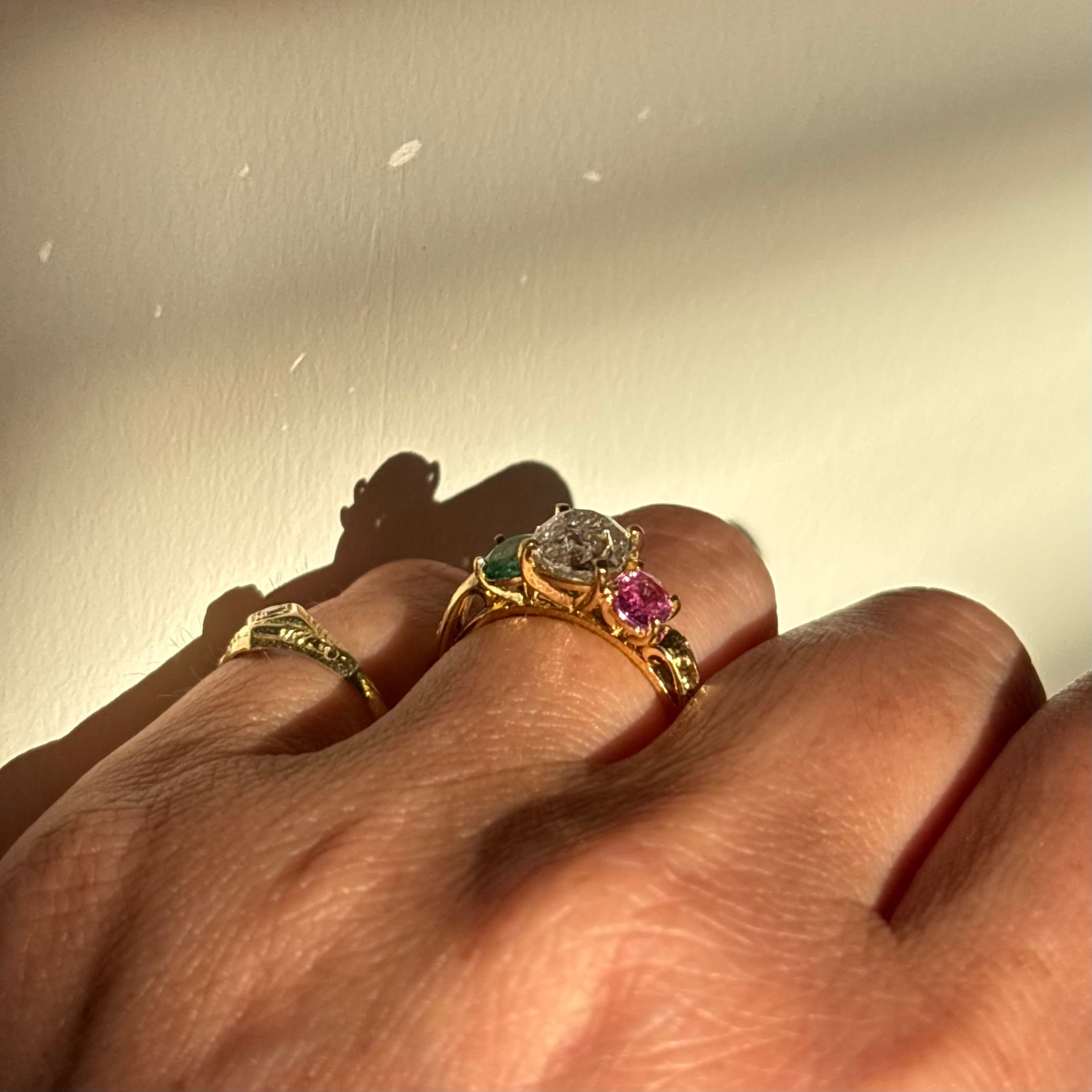 18ct yellow gold 1.569ct old cut vintage diamond, emerald and pink sapphire ‘Two Become One’ engraved ring