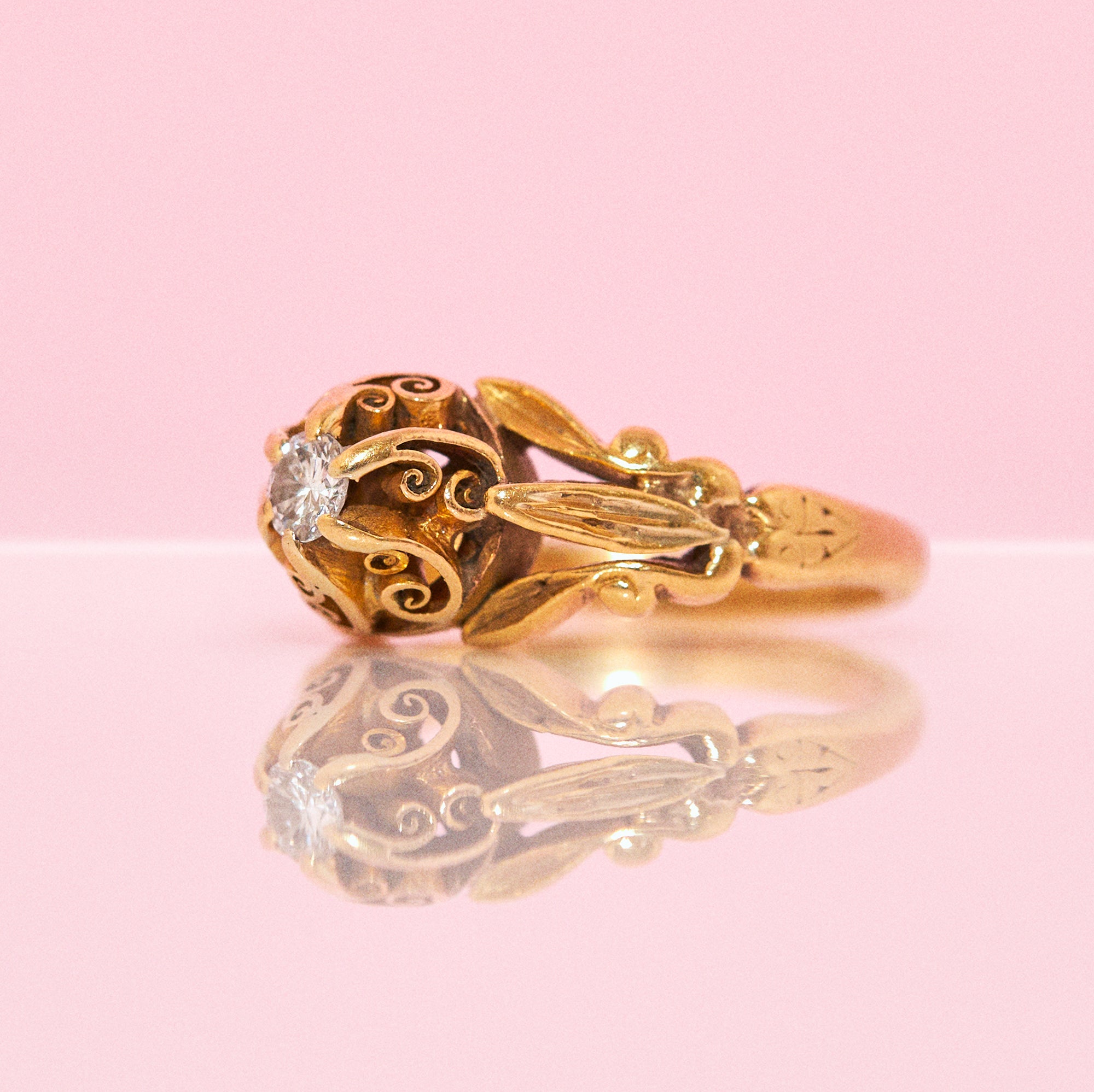 18ct gold carved diamond ring
