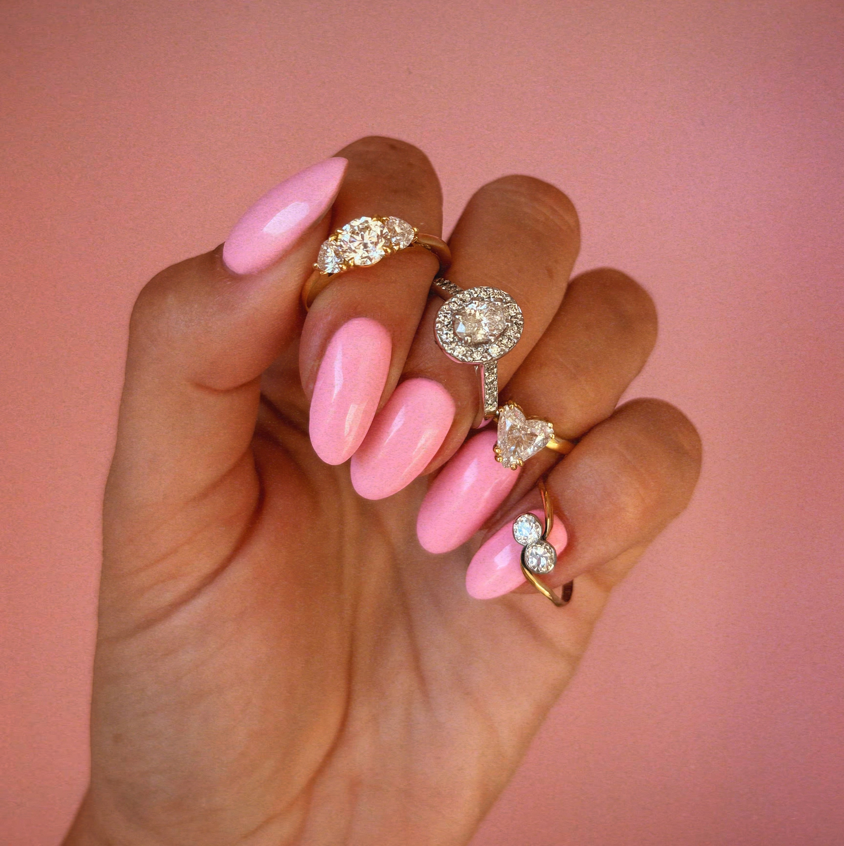 18ct gold 0.90ct round cut centre and two heart shaped diamond ‘Hidden Hearts’ ring