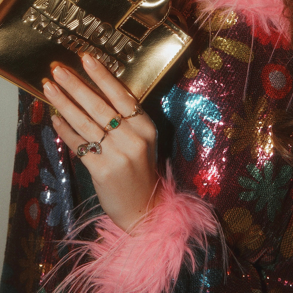 Platinum heart-shaped ruby and diamond vintage earring conversion ring