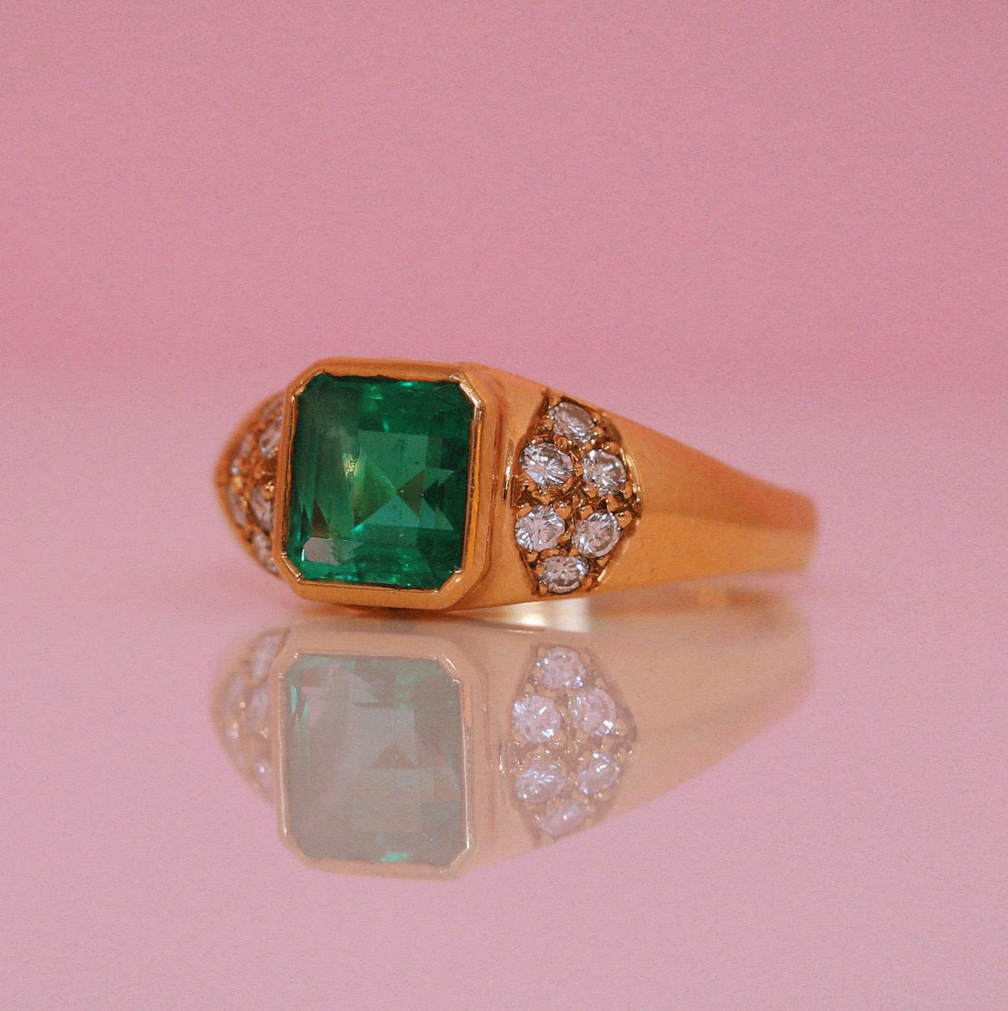 18ct gold emerald and diamond ring
