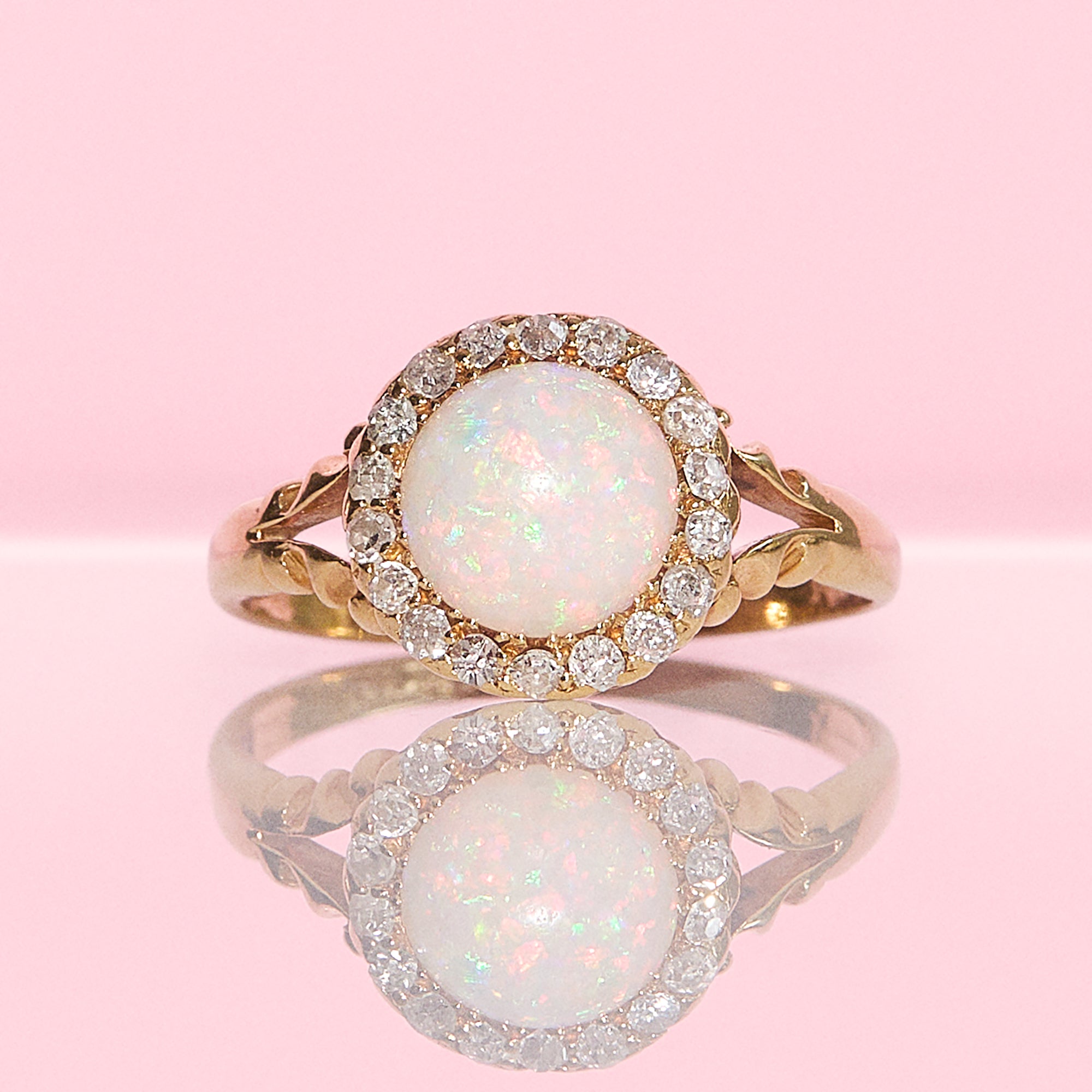 18ct gold round opal and diamond cluster ring