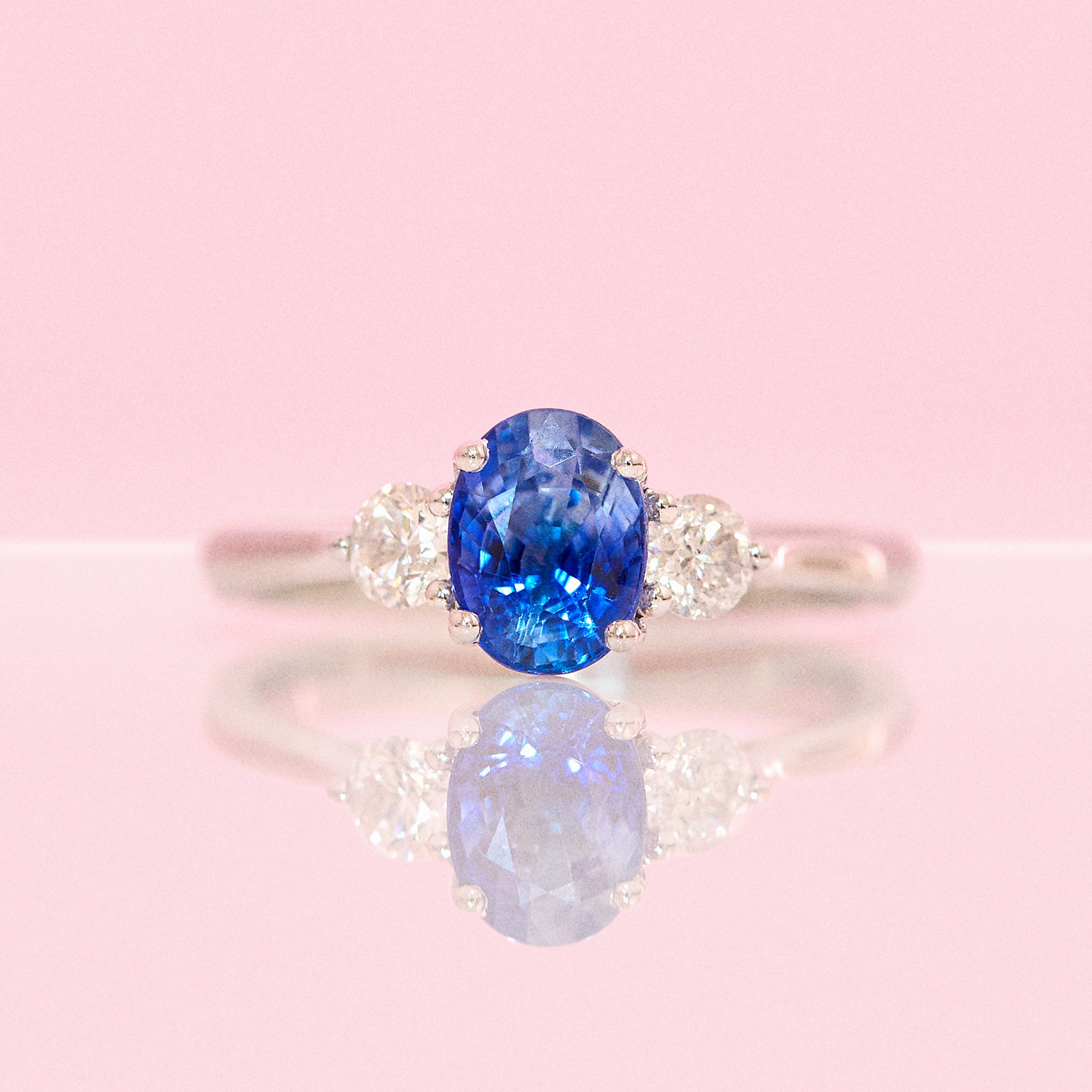 Platinum 1.10ct blue sapphire and diamond three stone ring (made to order)