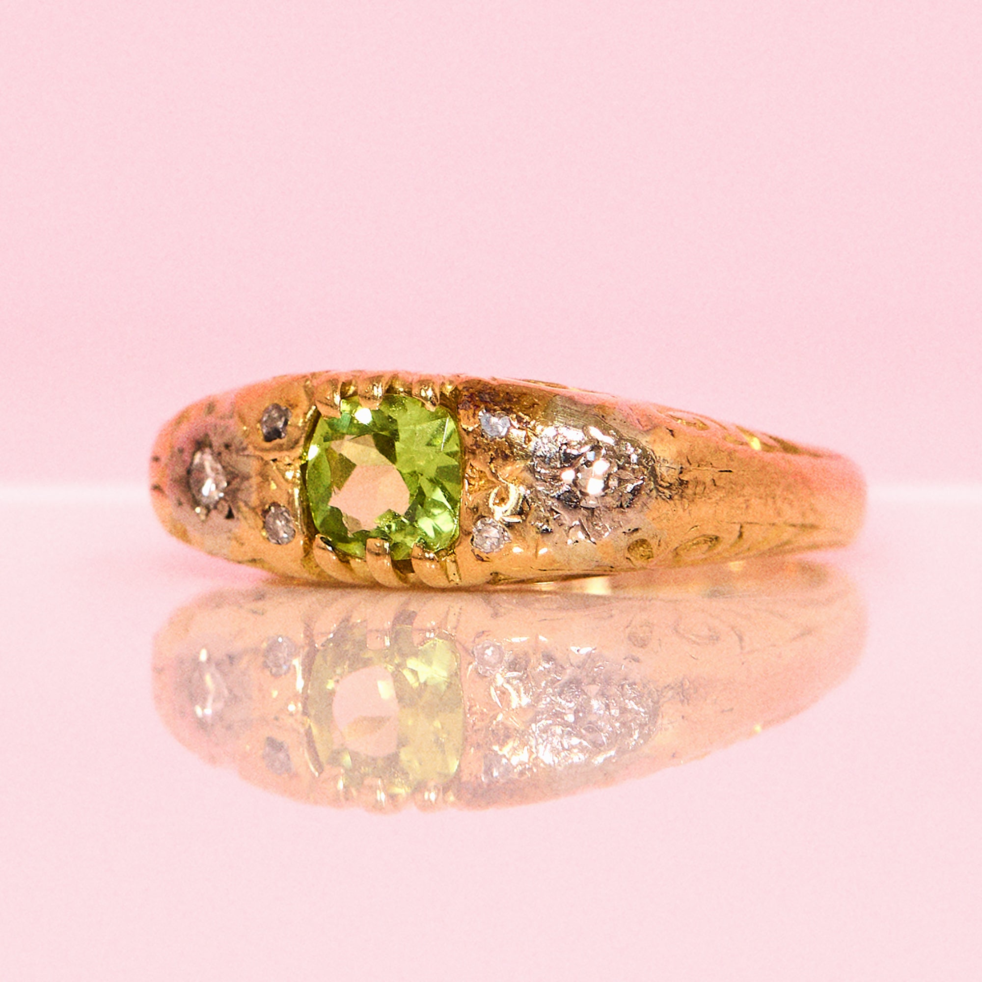 18ct gold peridot and diamond carved ring from 1966