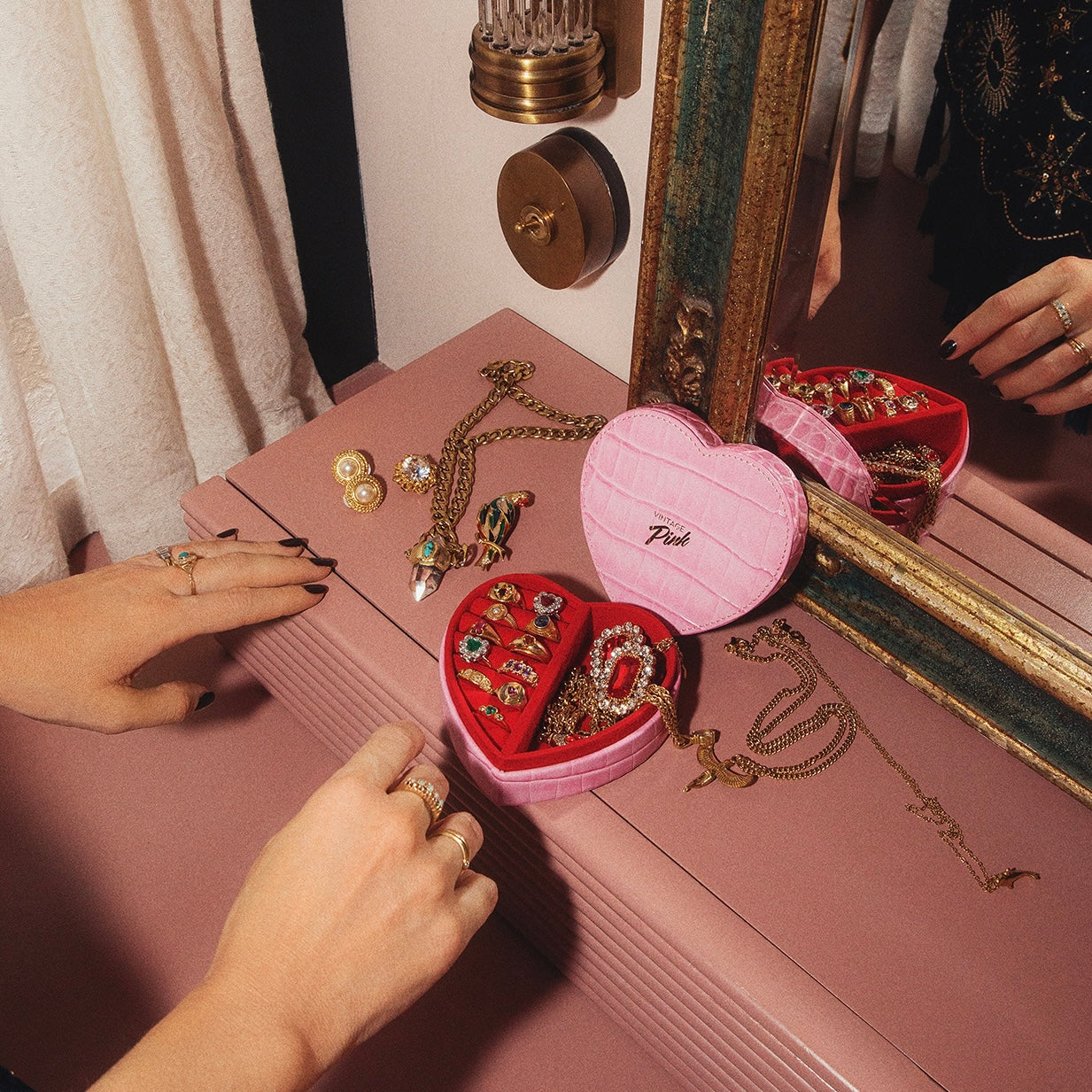 Heart-shaped pink faux croc and red velvet jewellery box