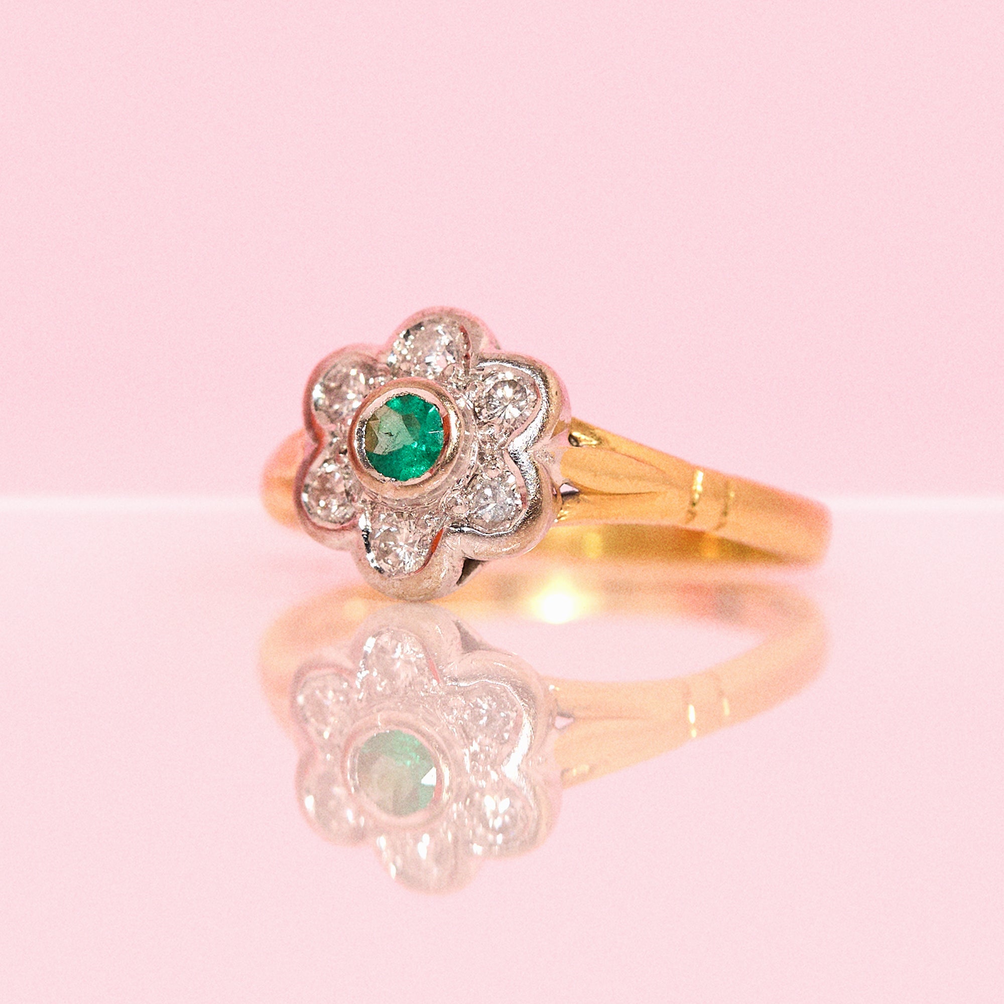 18ct gold emerald and diamond flower ring