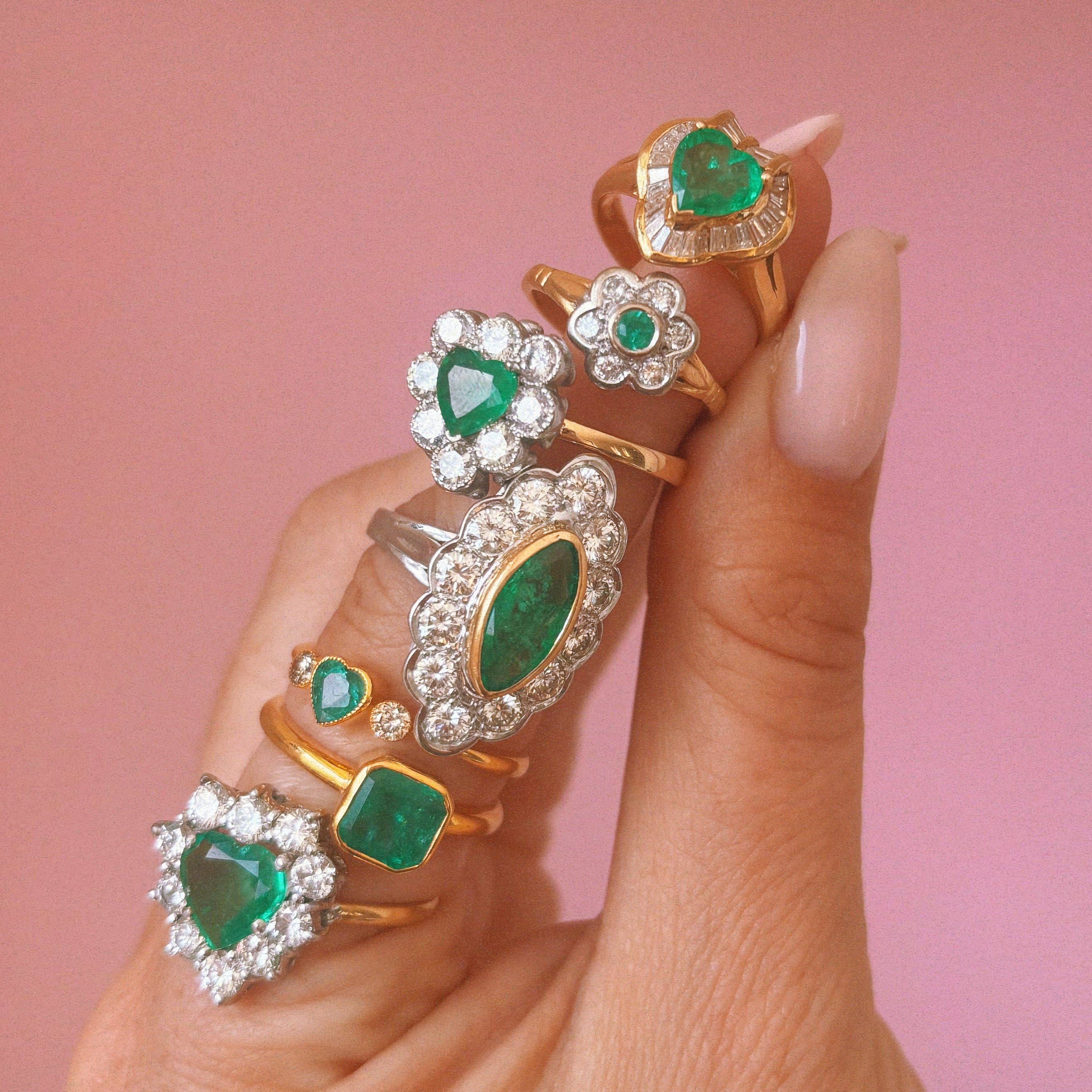 18ct white gold bezel set marquise emerald and diamond ring