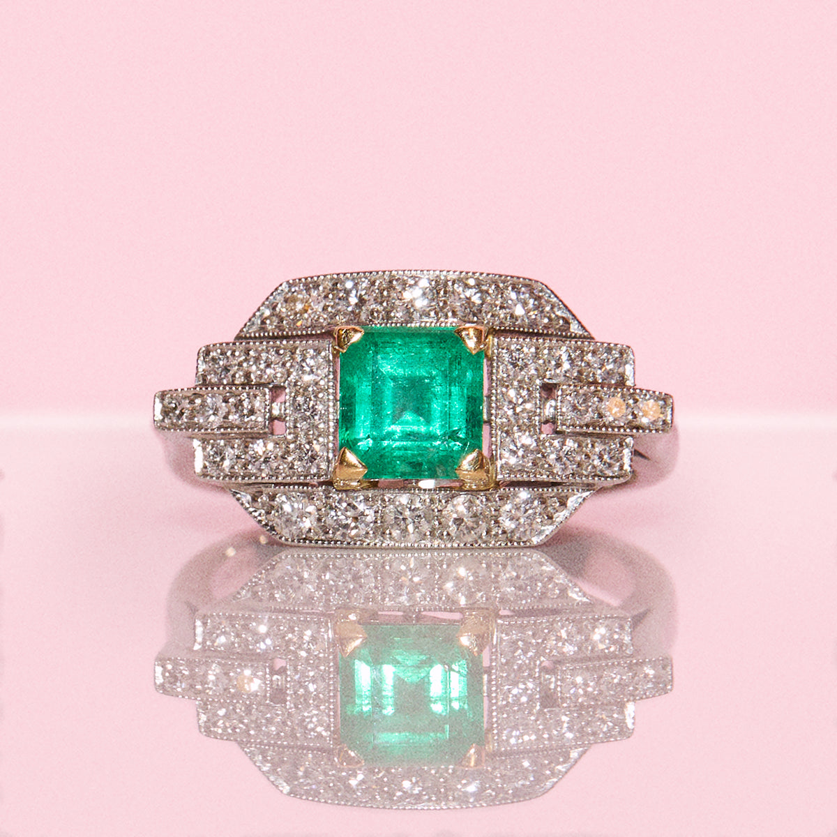 Vintage Platinum gold 0.75ct emerald and 0.50ct diamond ring