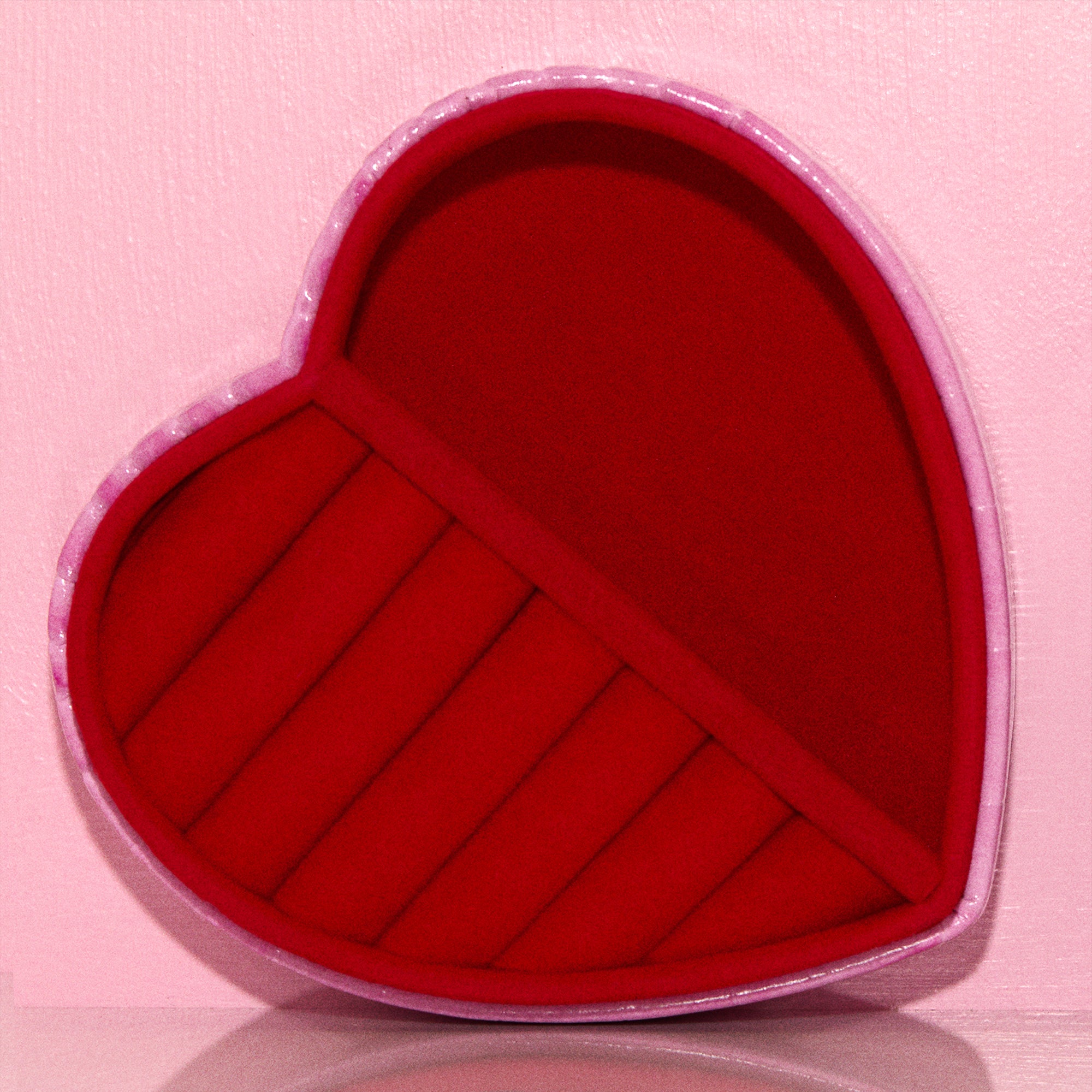 Heart-shaped pink faux croc and red velvet jewellery box