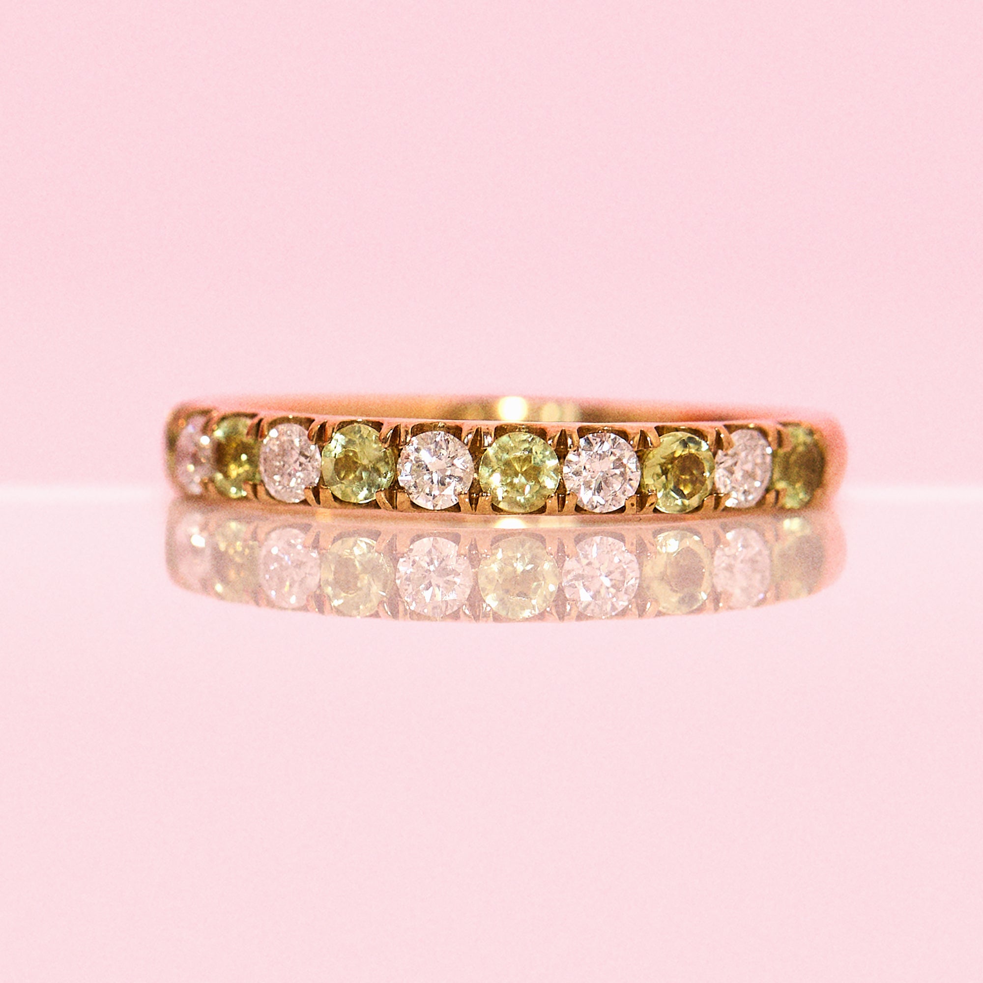 9ct gold 0.43ct peridot and 0.30ct diamond half-eternity ring