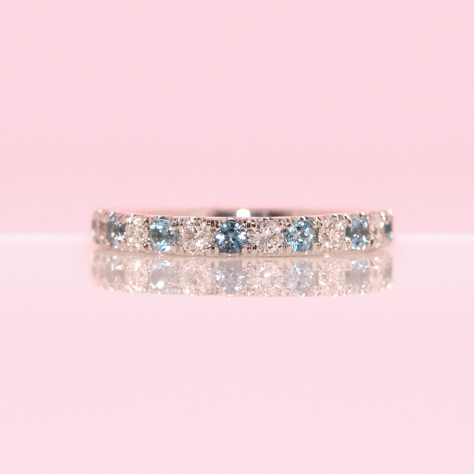 Platinum diamond and aquamarine half-eternity ring (made to order)