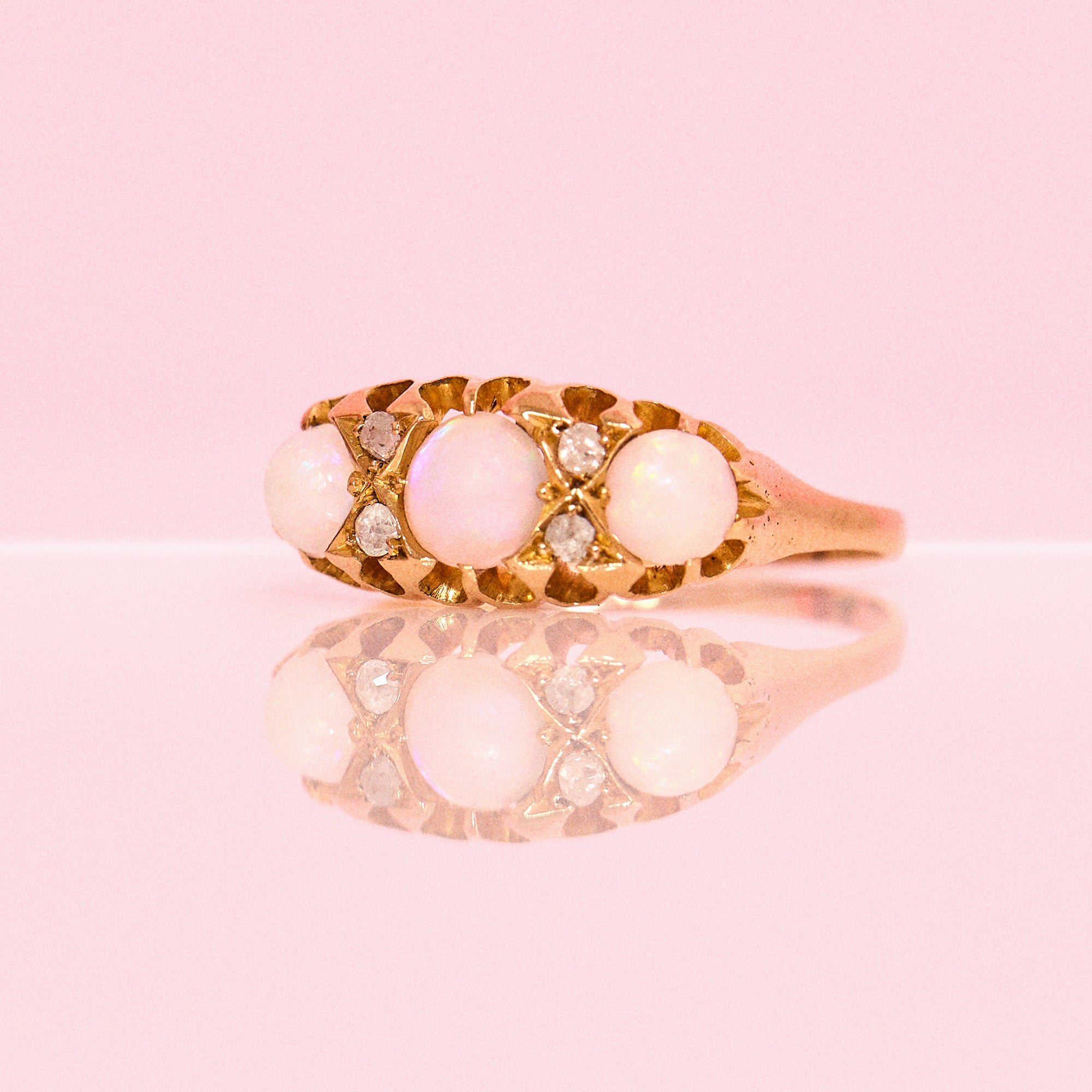 18ct gold opal and diamond seven stone ring